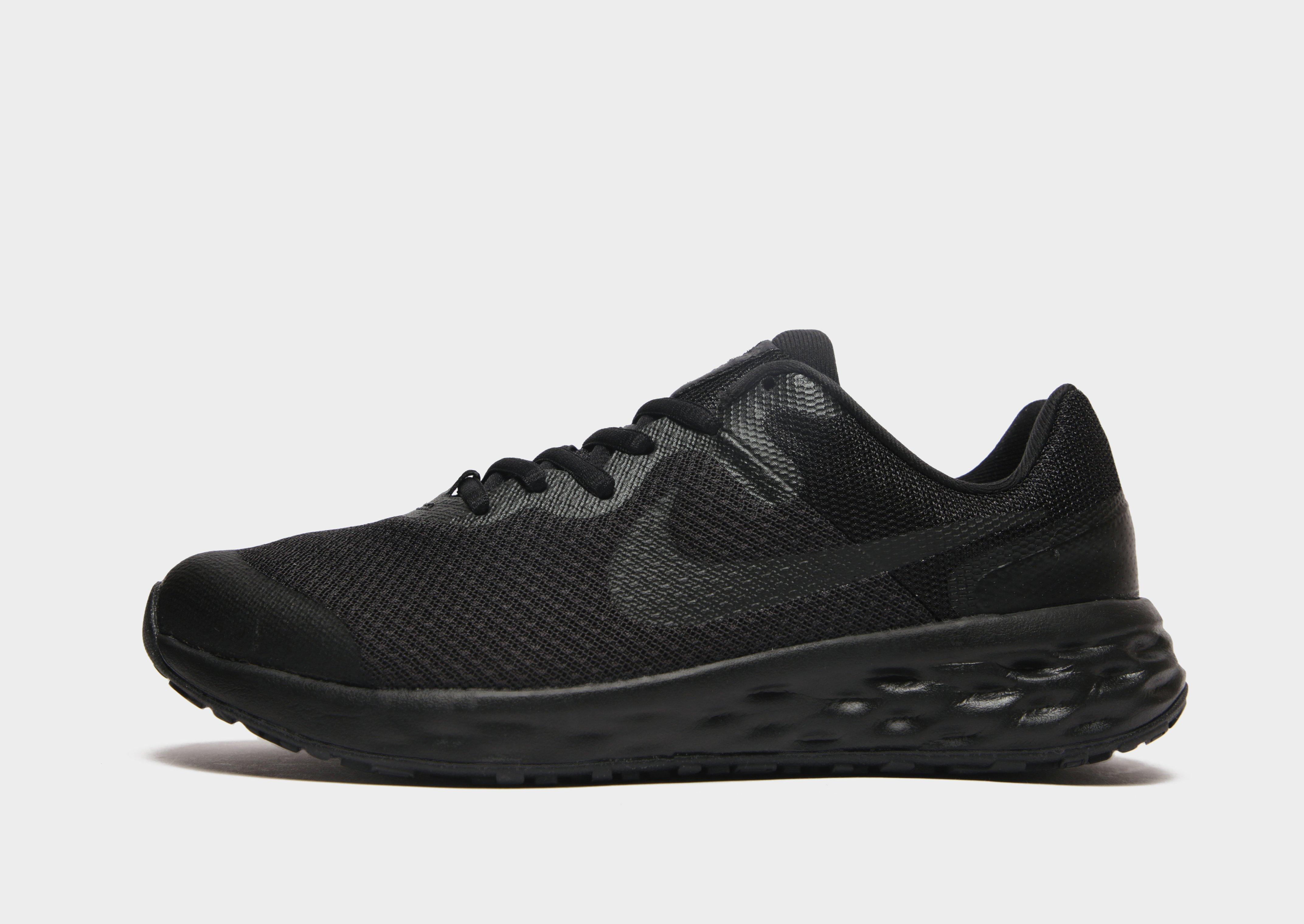 nike run black revolution junior trainers