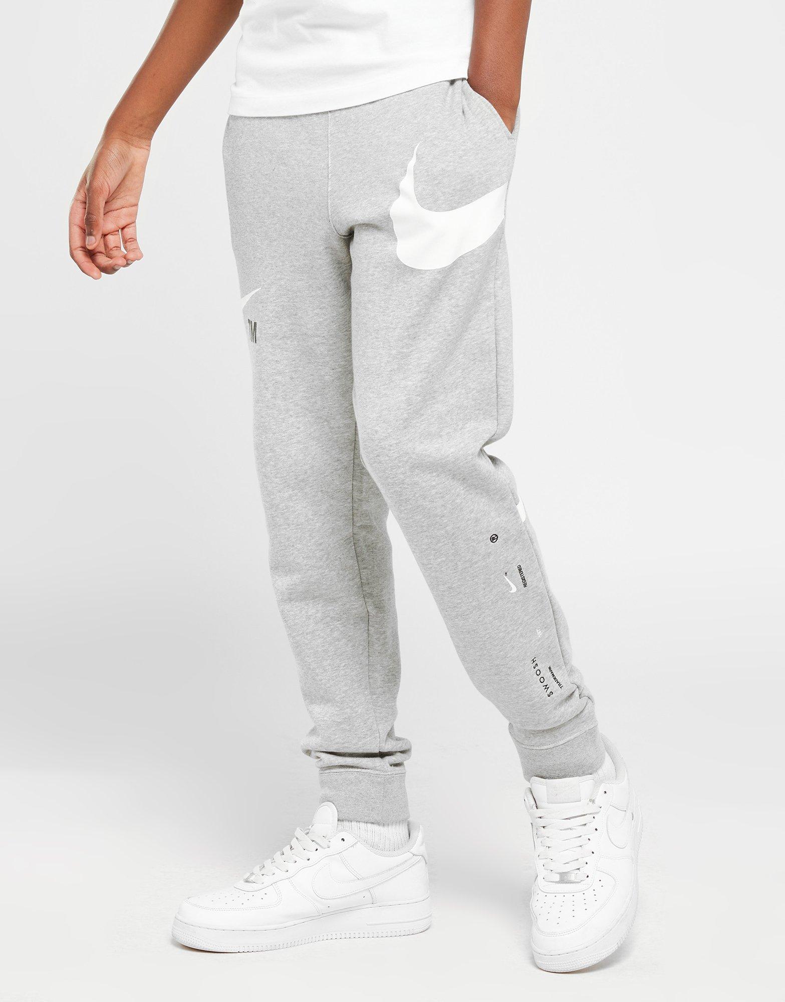 Nike Pantalon en tissu Fleece Nike Sportswear Swoosh pour Garçon plus âgé