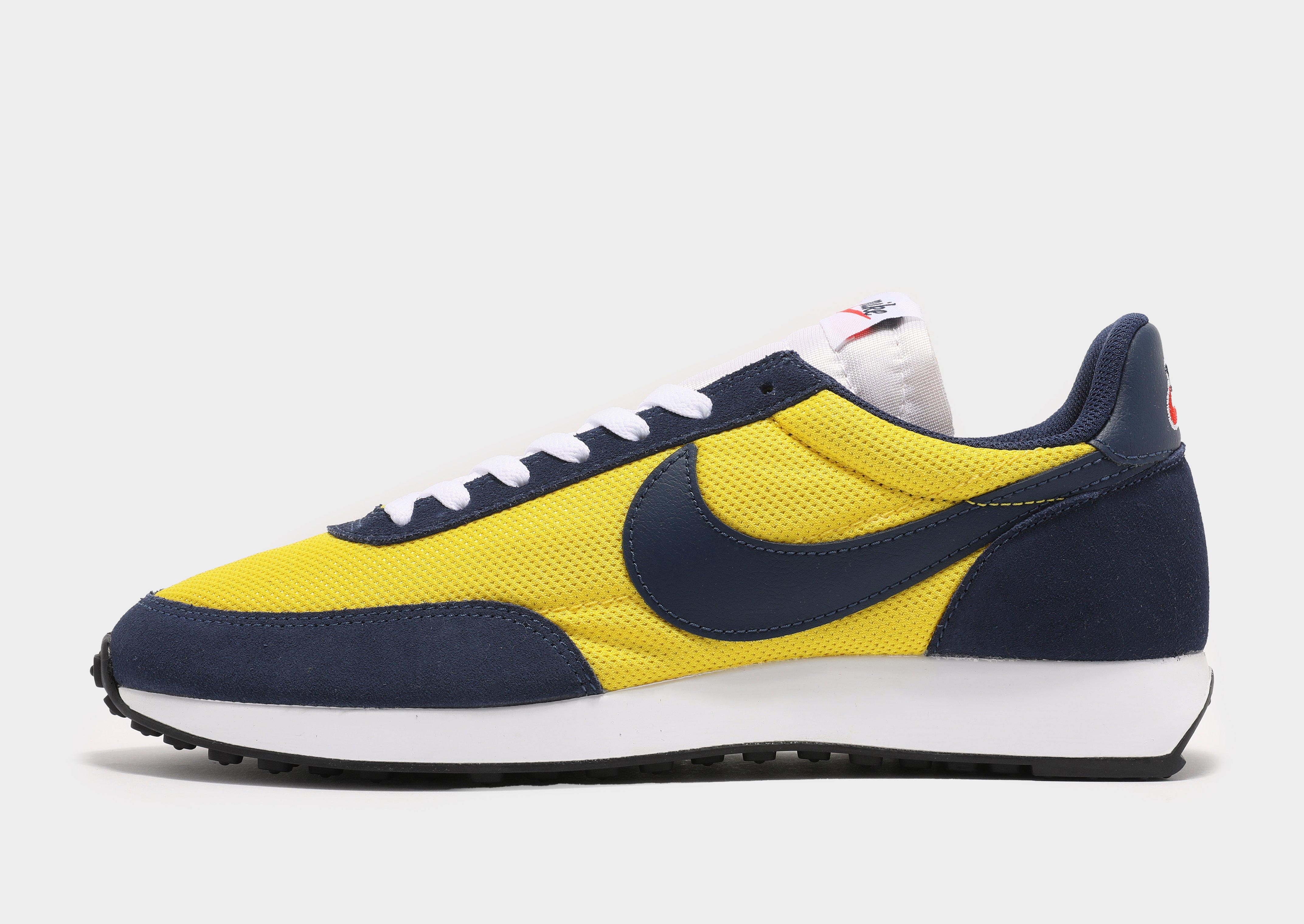 yellow nike tailwind