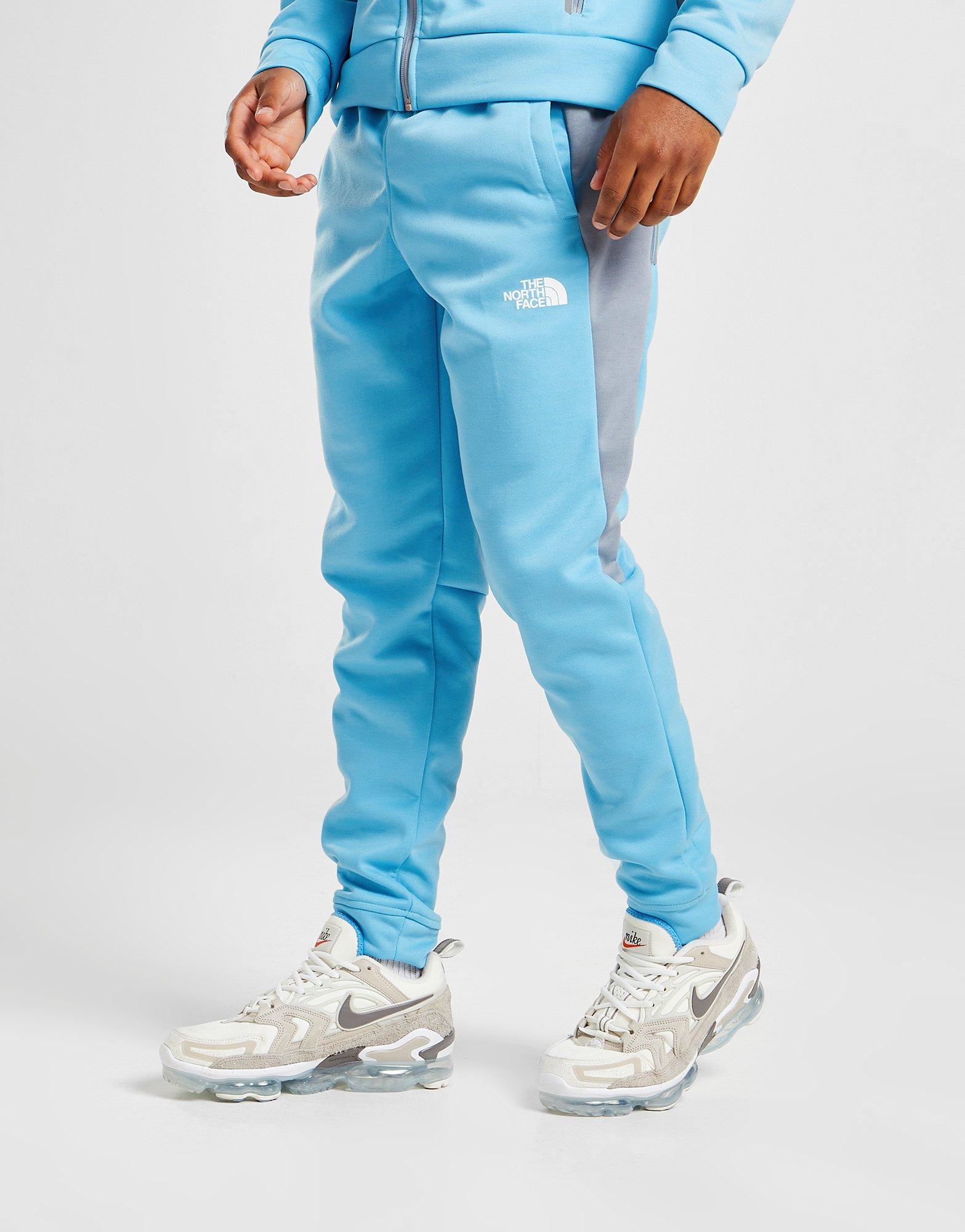 blue north face tracksuit bottoms