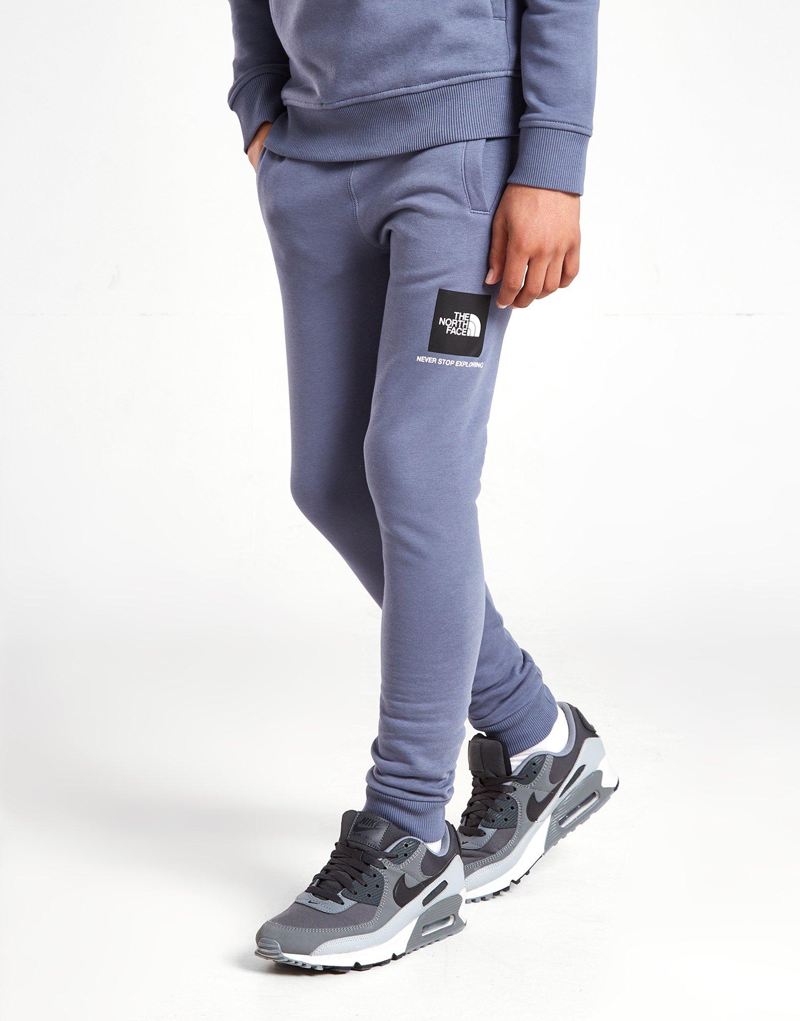 grey north face joggers junior