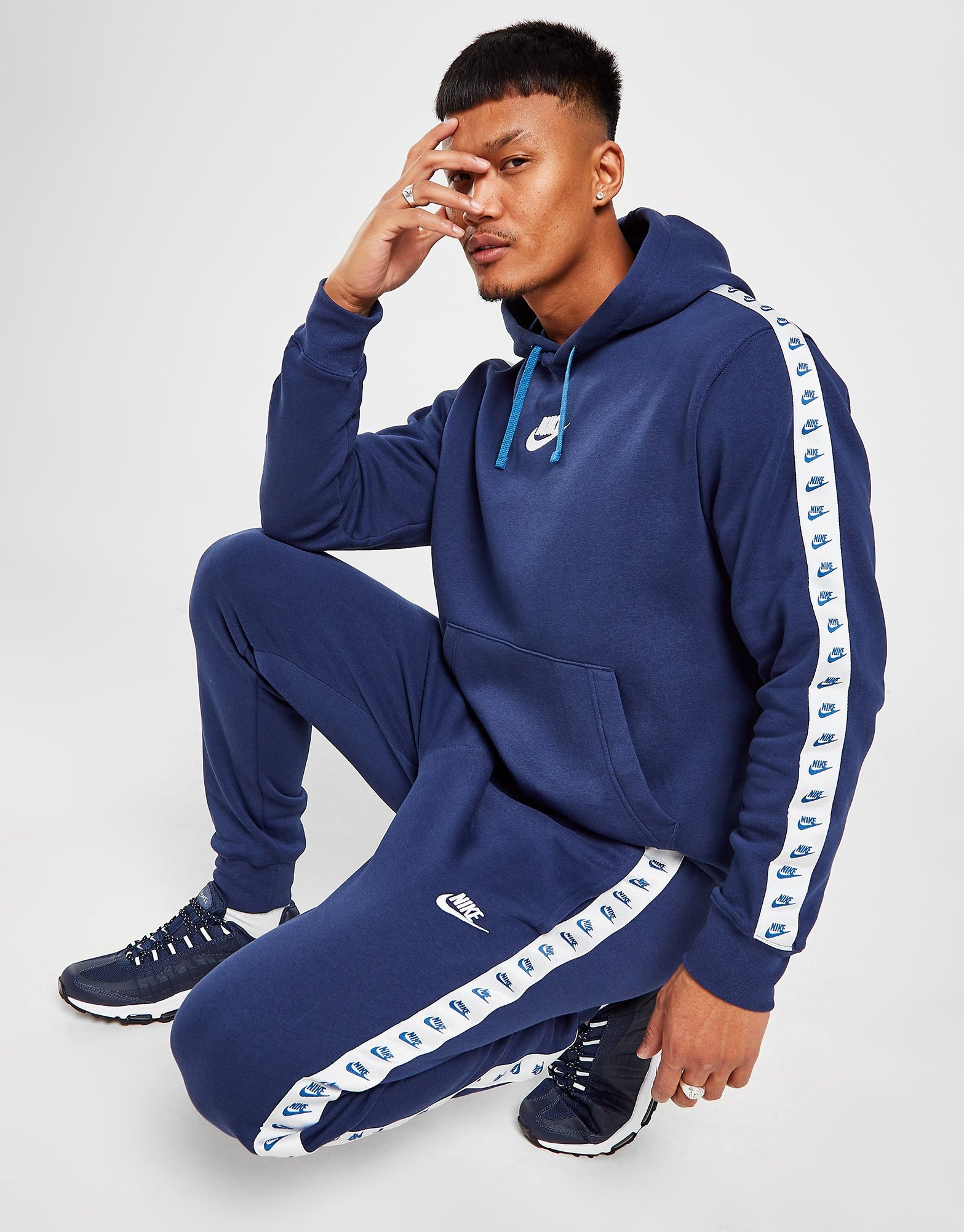 nike zeus tape tracksuit blue