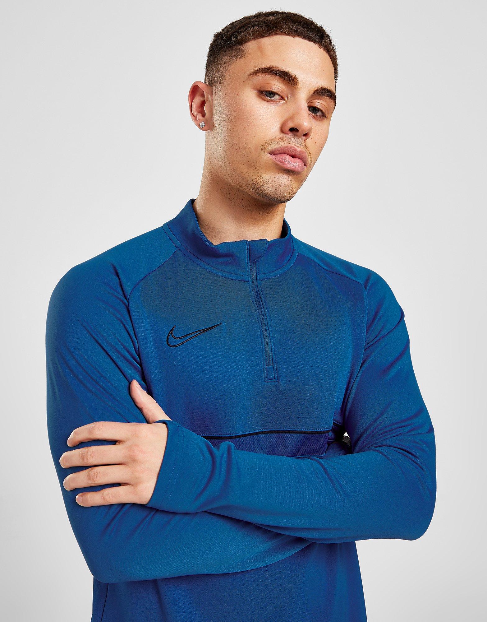 nike quarter zip track top