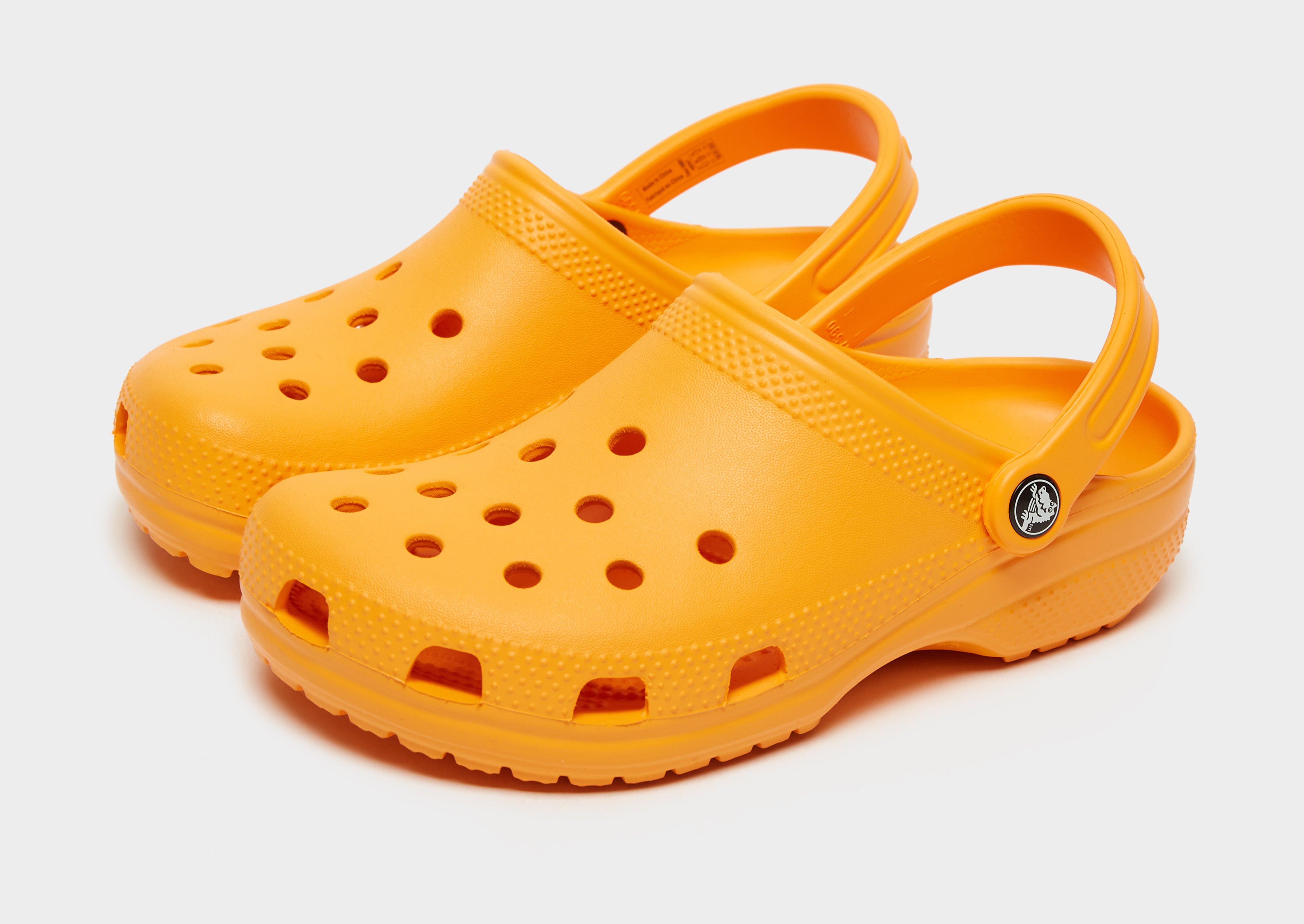 Designer Orange Crocs 🧡  Crocs fashion, Crocs with charms, Crocs