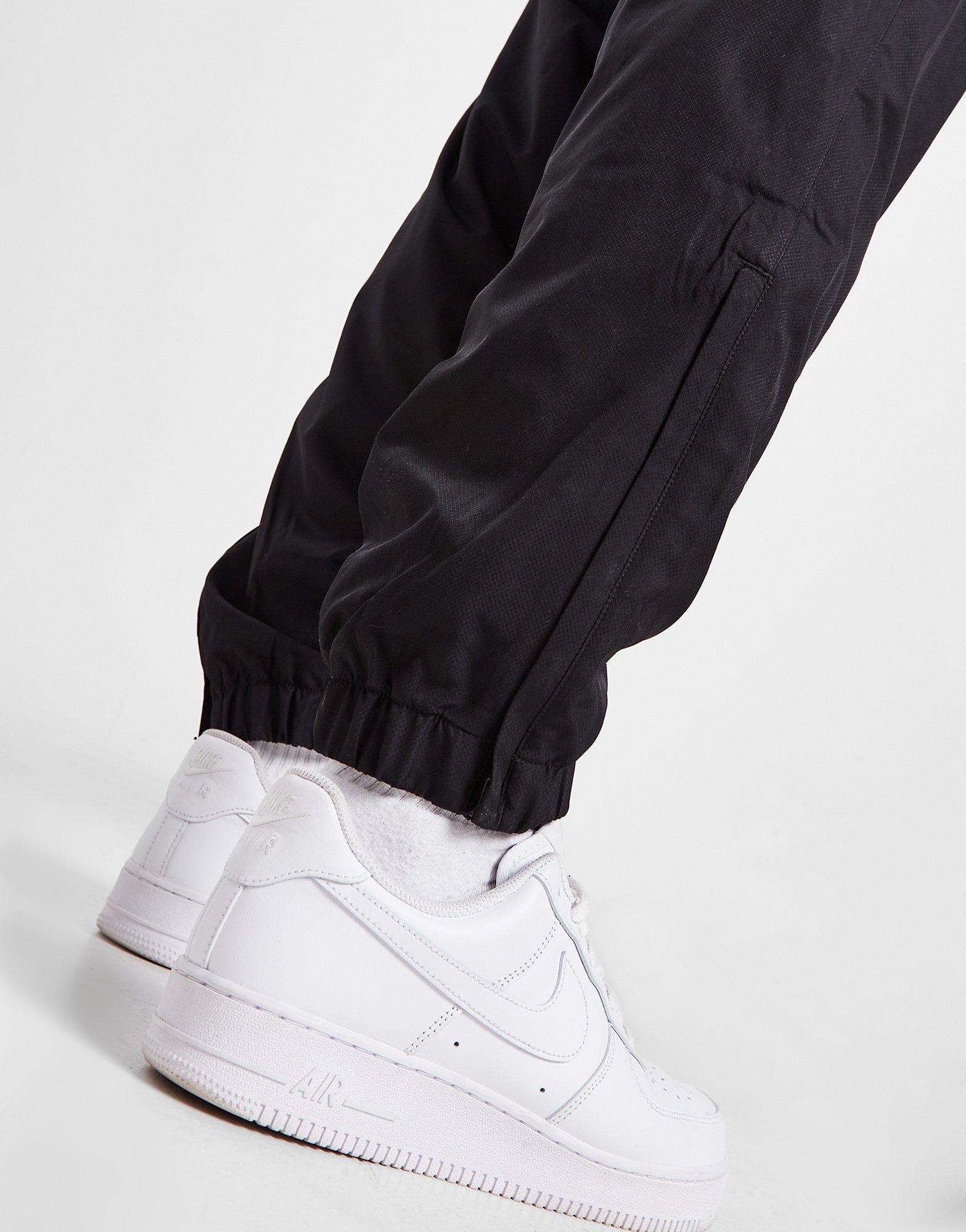 Nike guppy hot sale track pants