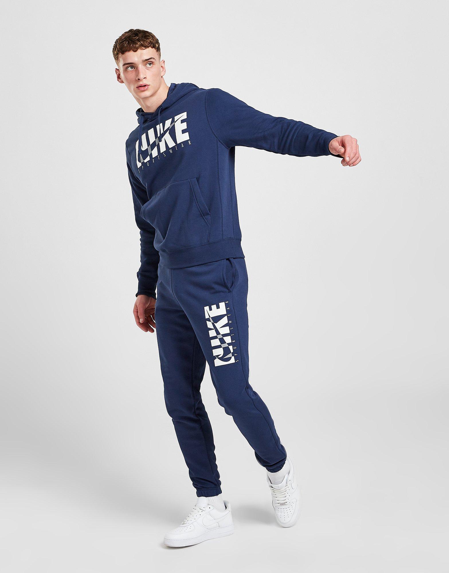 navy nike club tracksuit