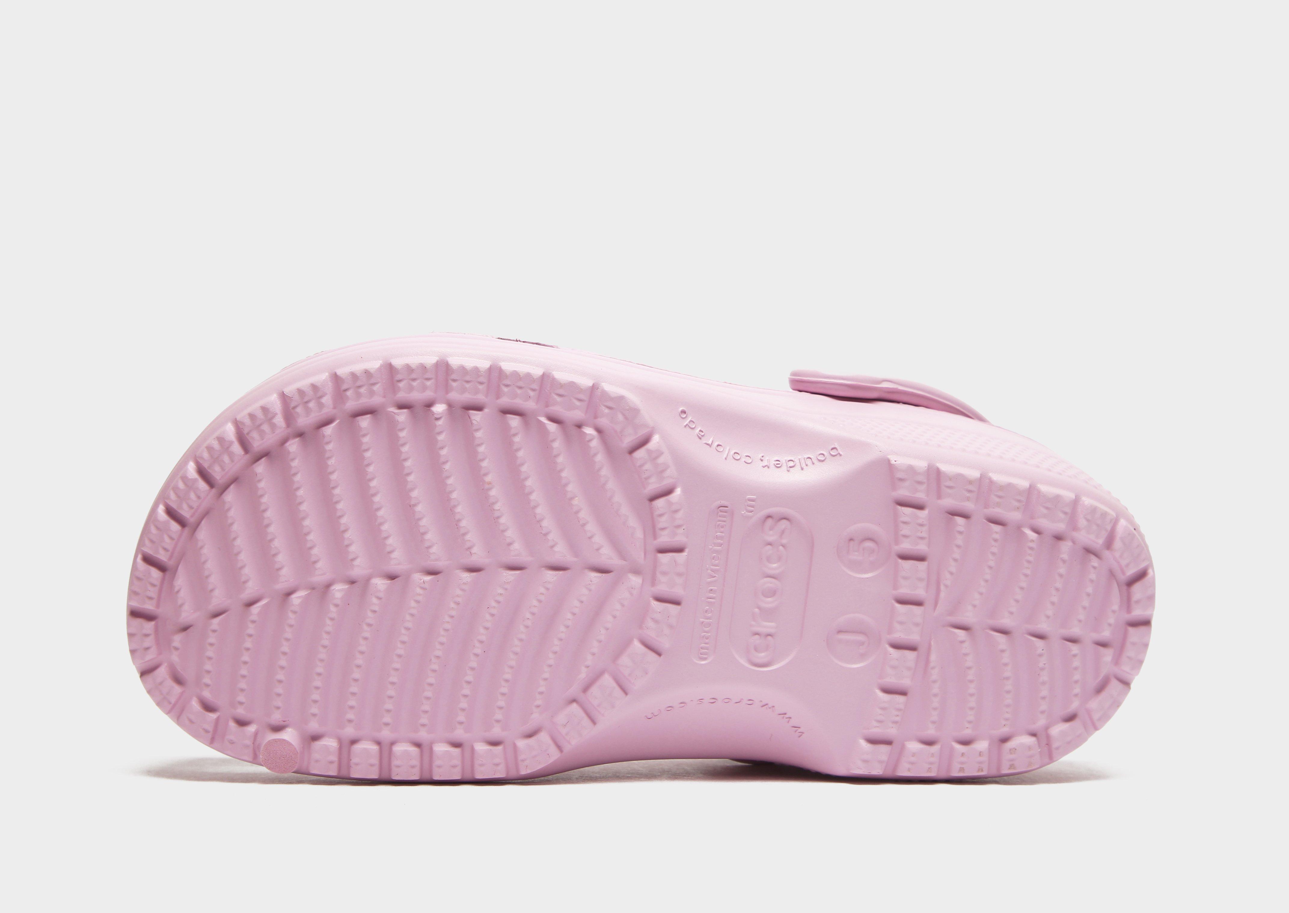 Pink croc tennis discount shoes