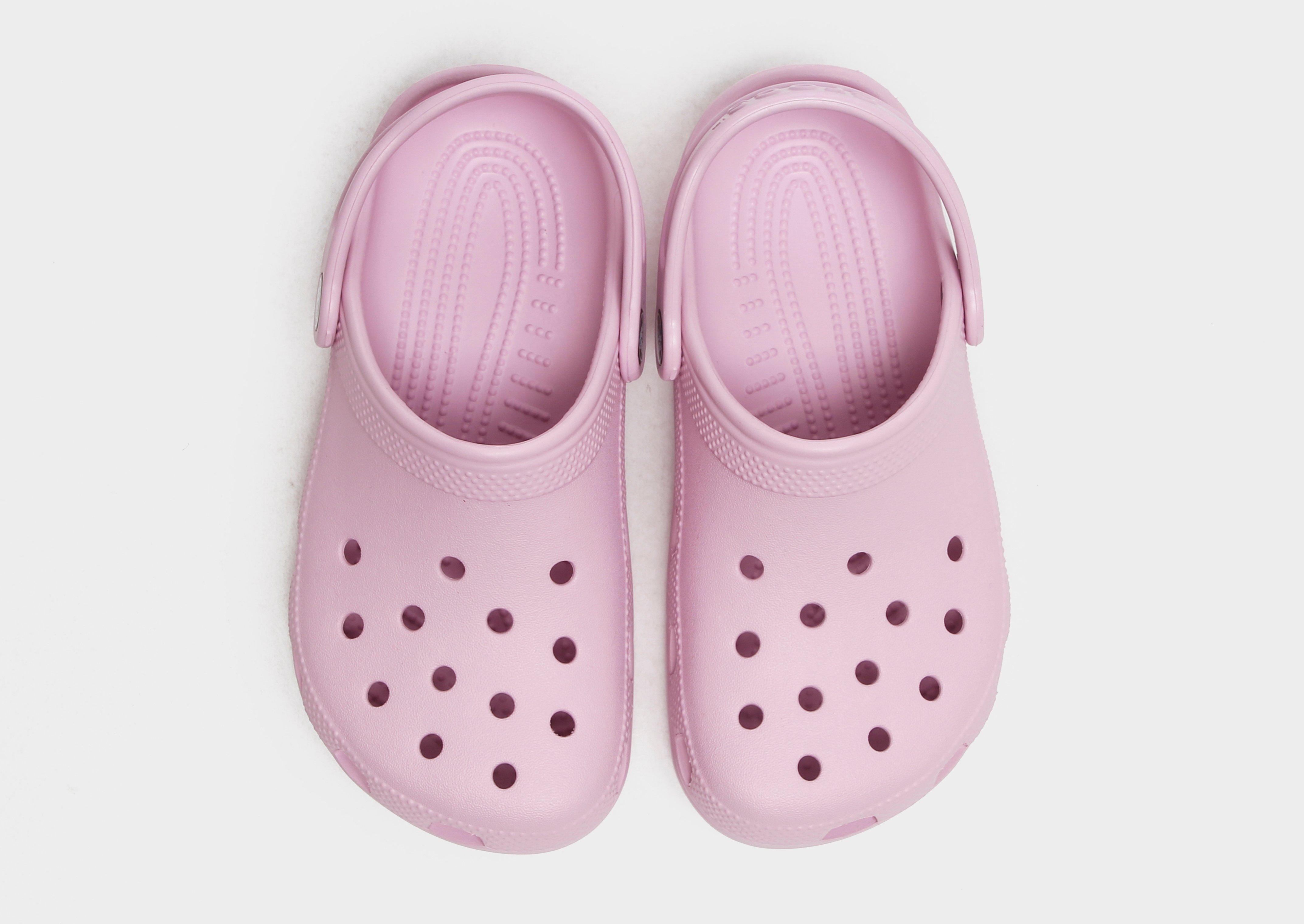 Pink best sale mens crocs