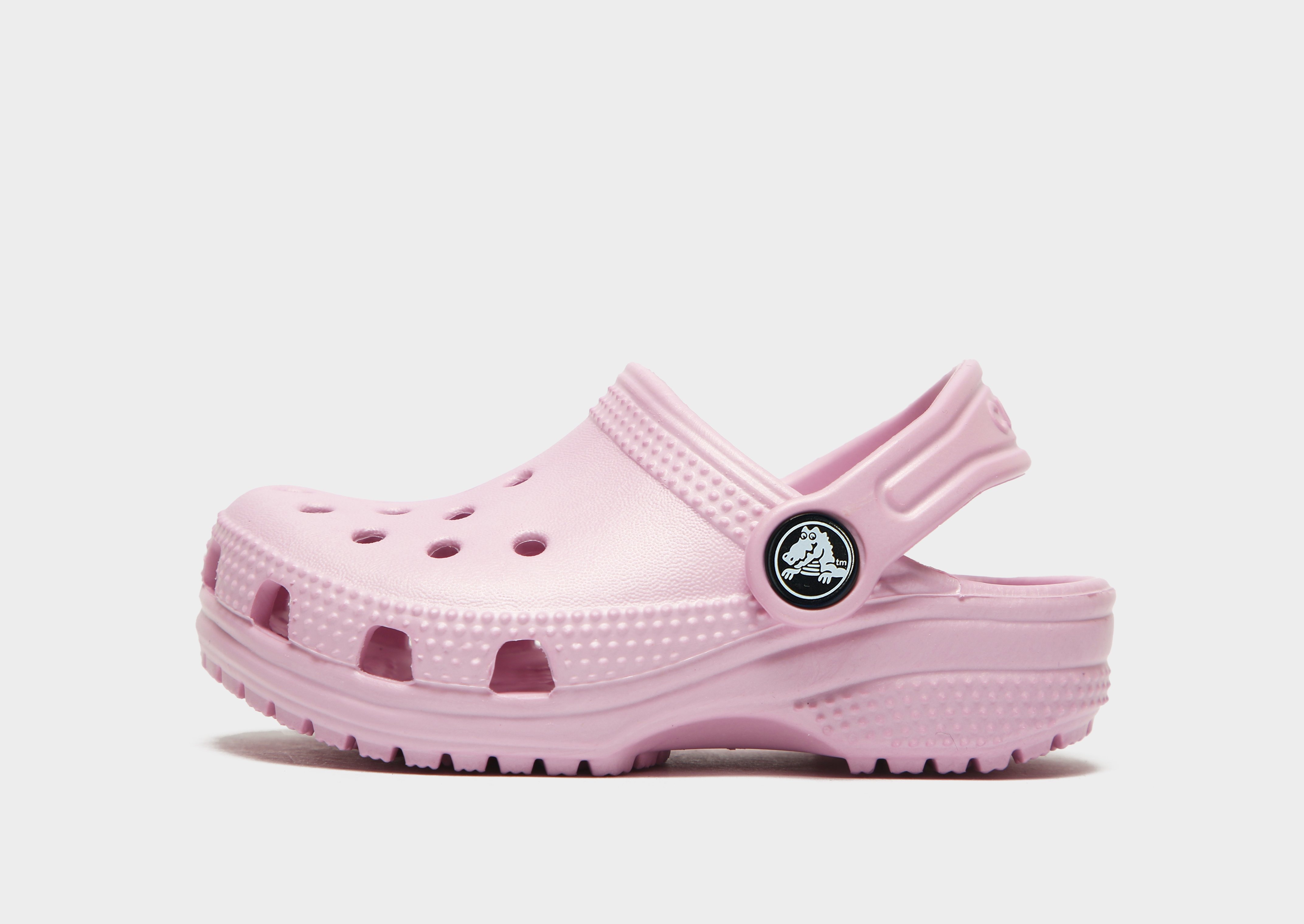 Compra Crocs zuecos Classic para bebé en Rosa