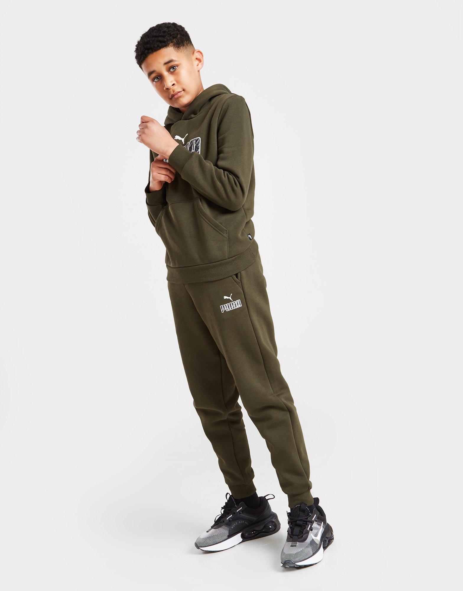 green puma tracksuit junior