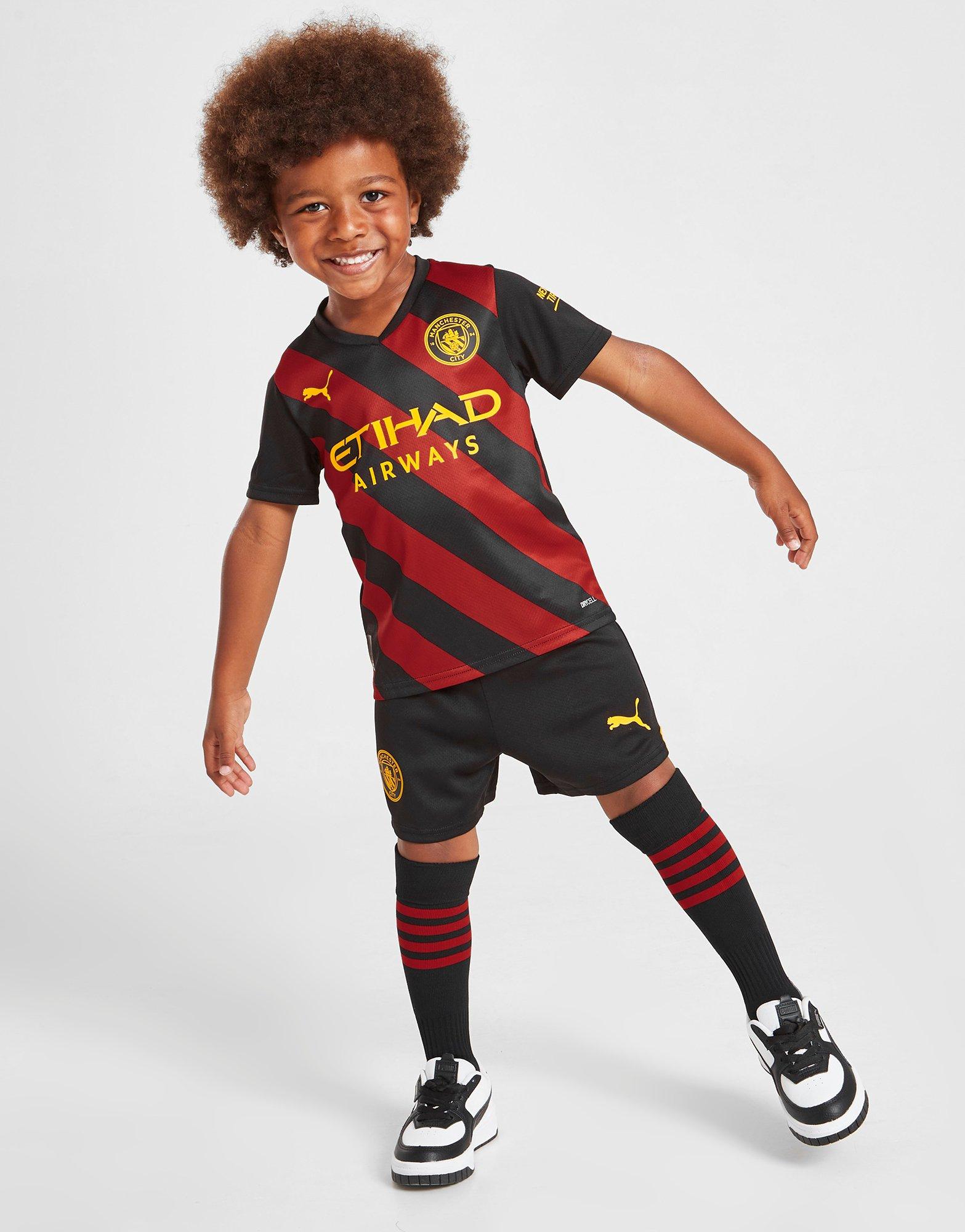 Man city away store kit kids