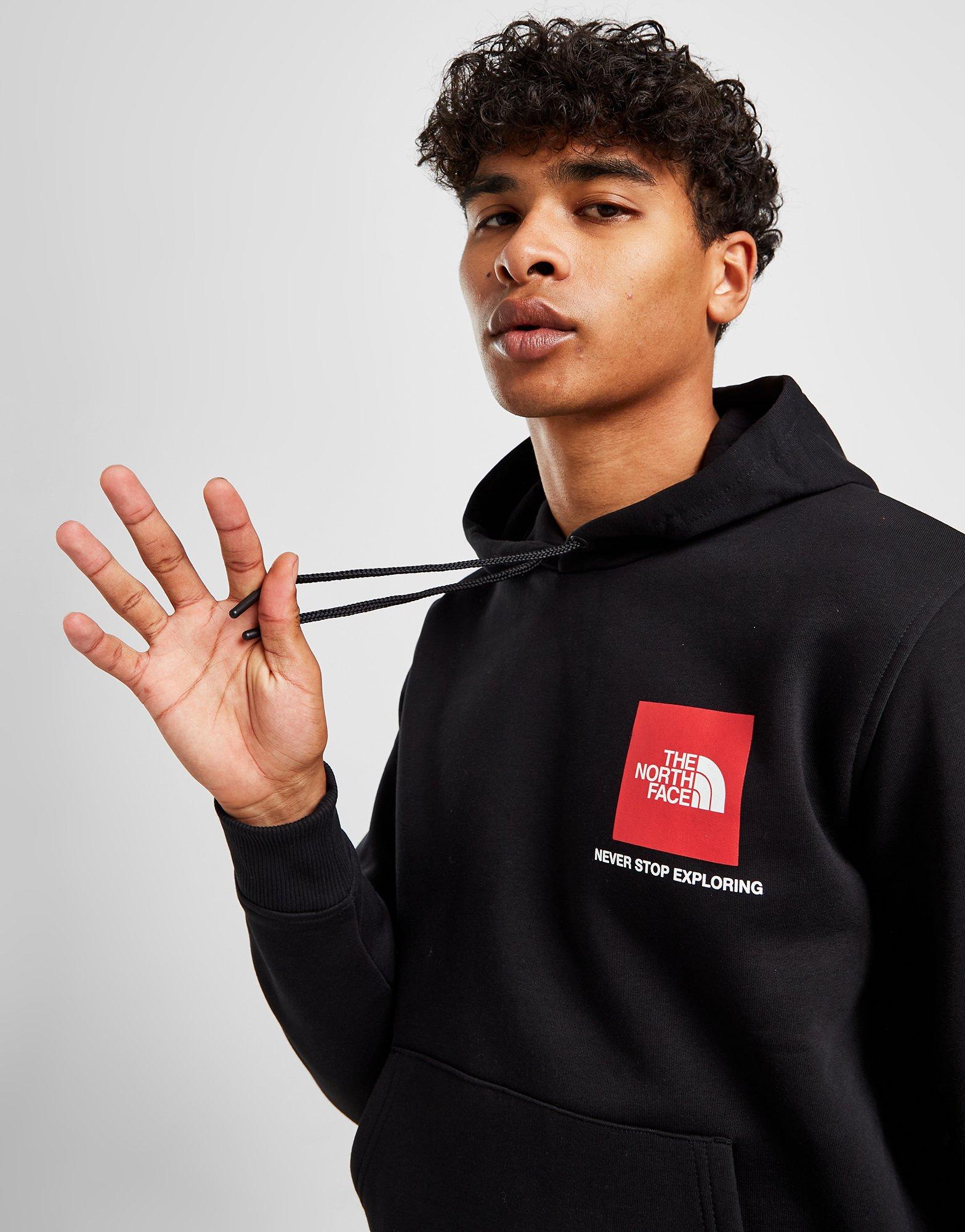 Black north face hoodie with store red logo