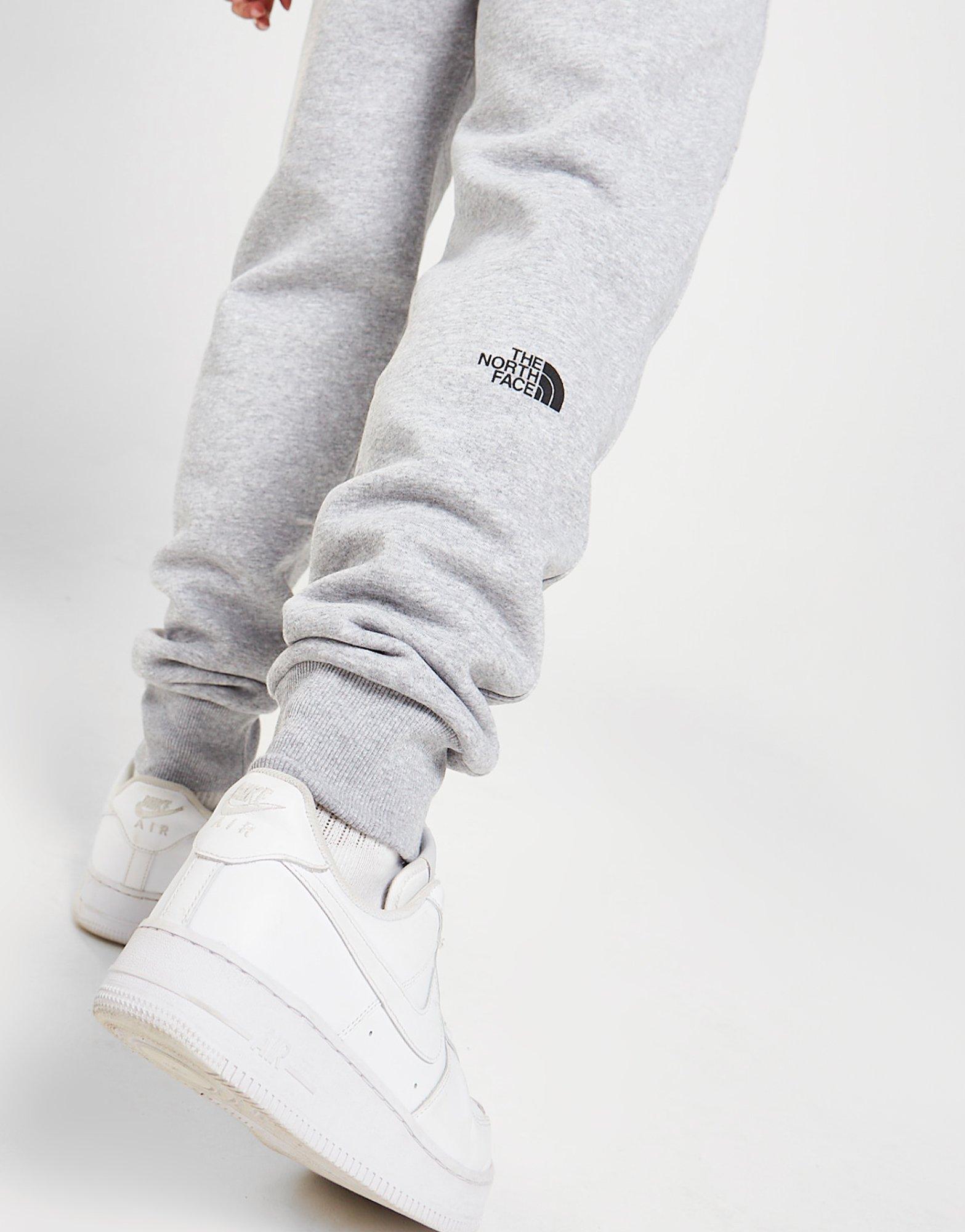 Light grey store north face tracksuit