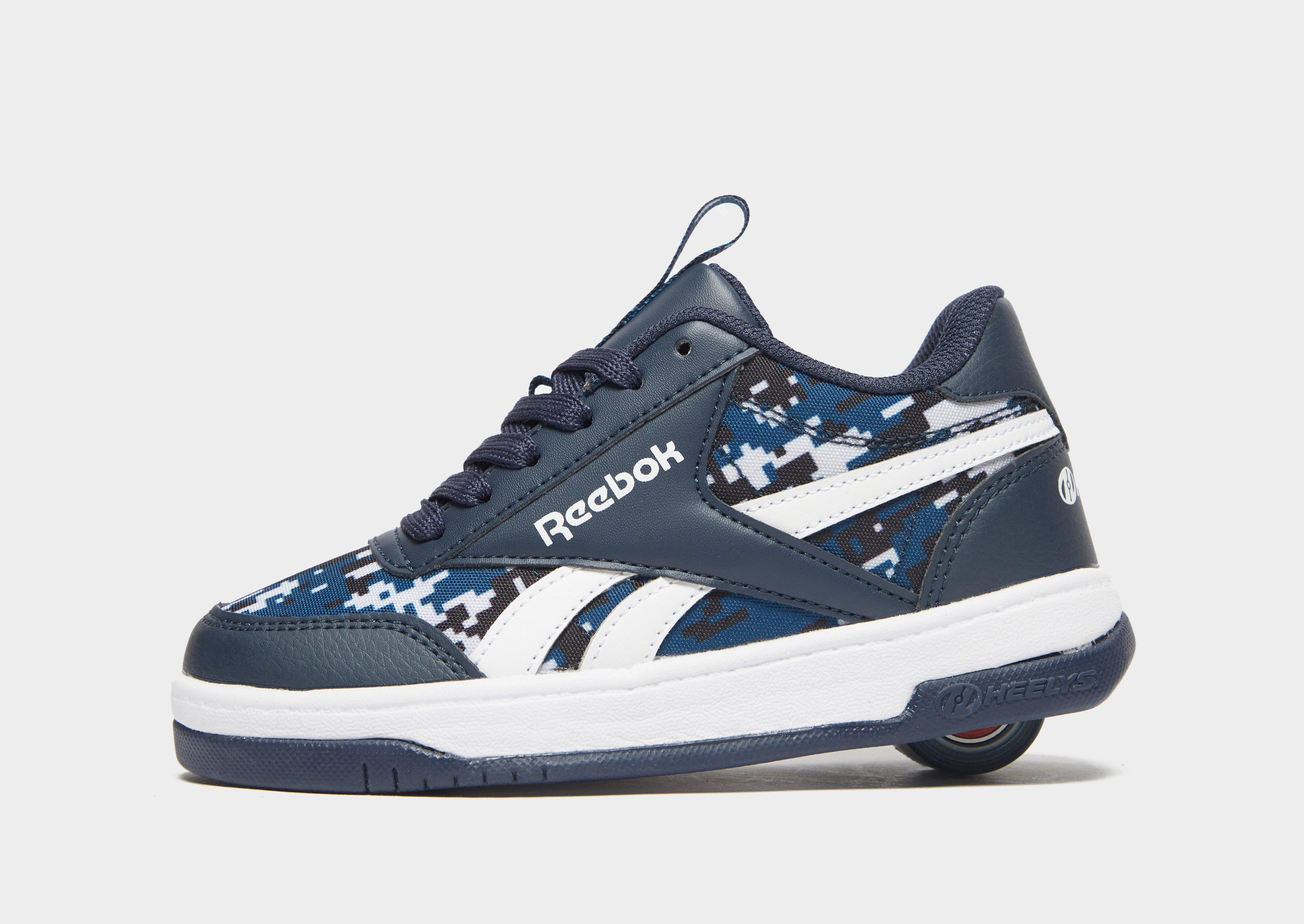 mens reebok heelys