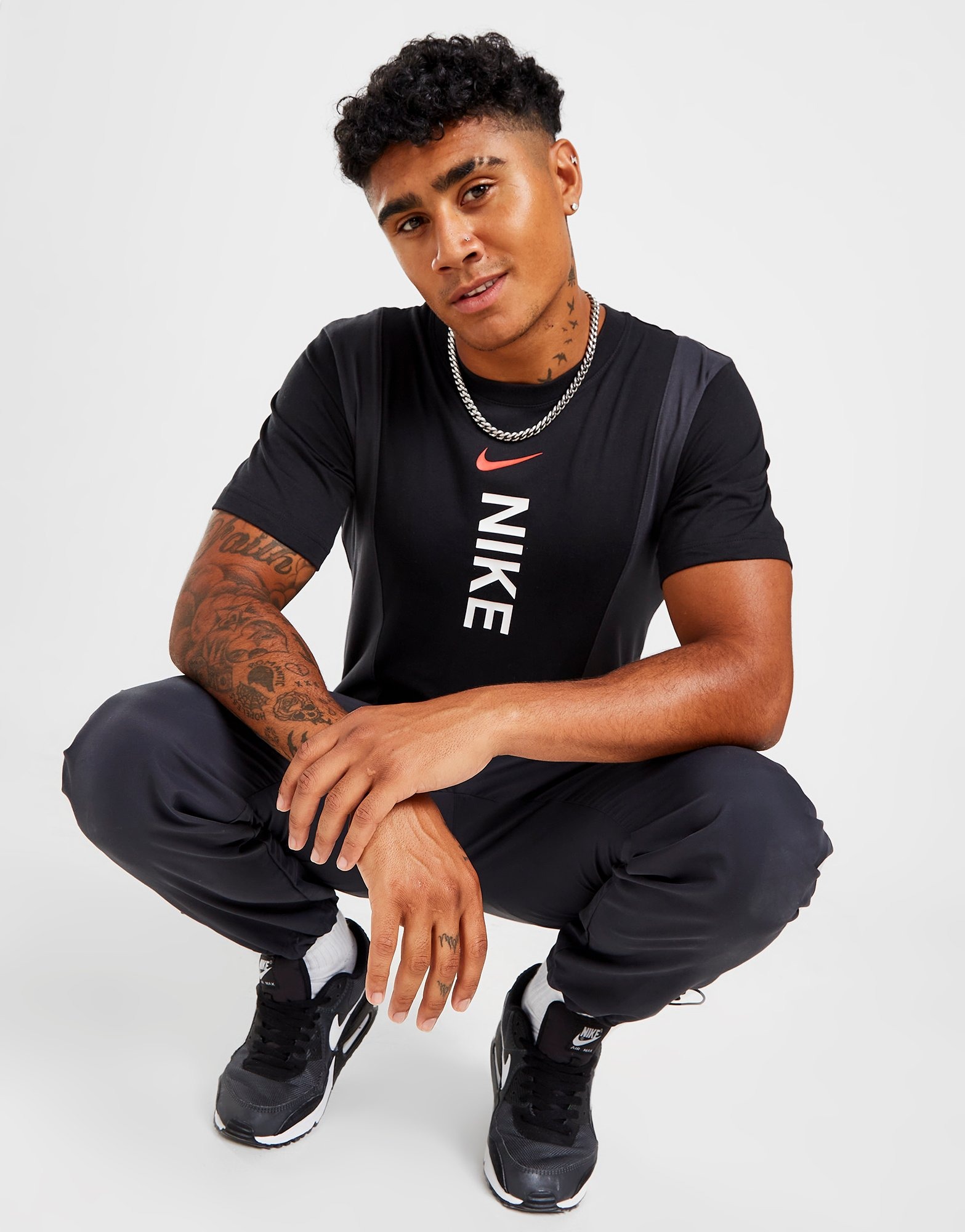 Black Nike Hybrid T-Shirt | JD Sports UK
