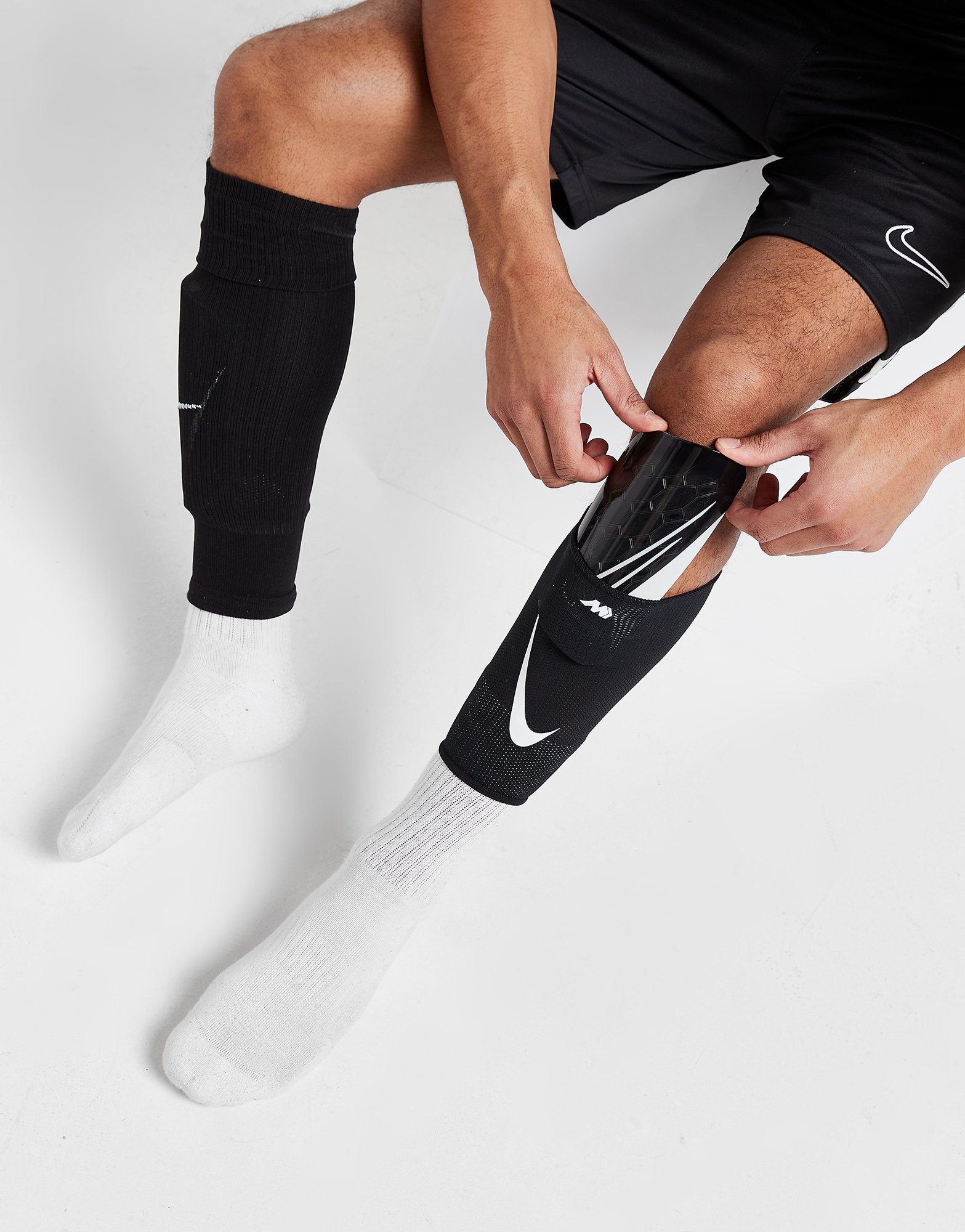 Ingenieria impaciente probable Nike espinilleras Mercurial Lite en Negro | JD Sports España