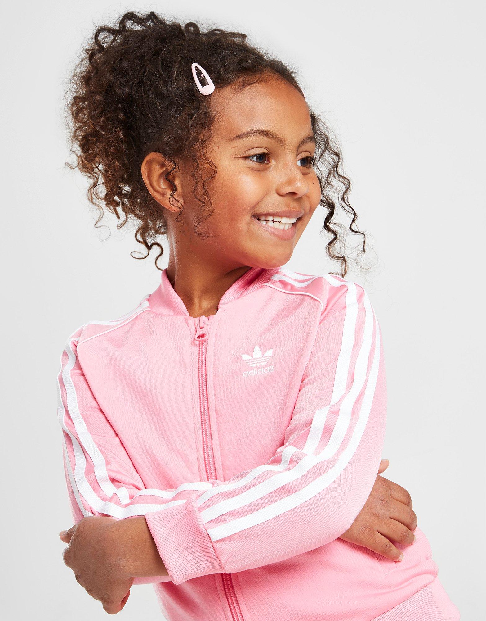 Pink adidas tracksuit girl hotsell