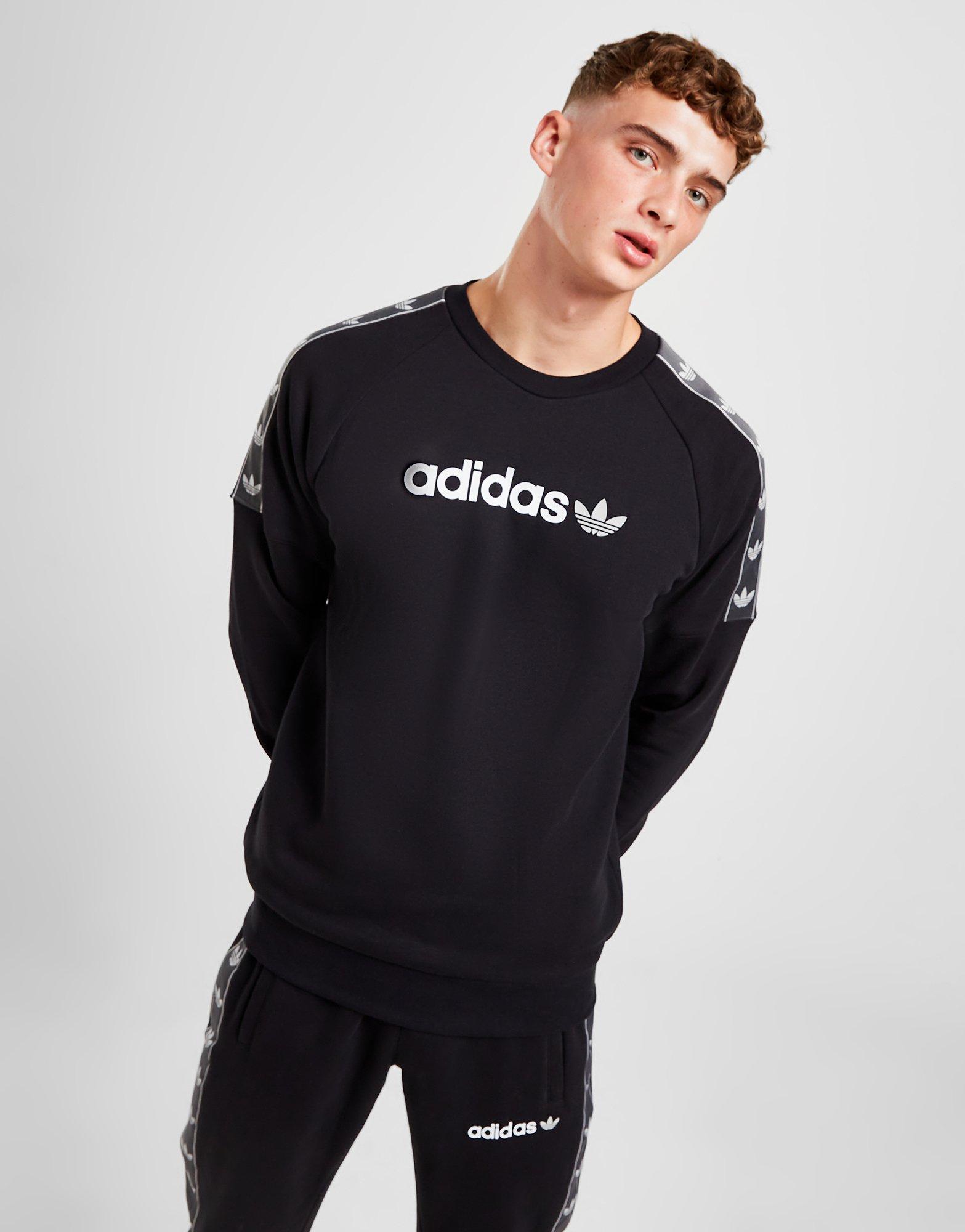 Prevalecer calor Empleado adidas Originals sudadera Tape en Negro | JD Sports España