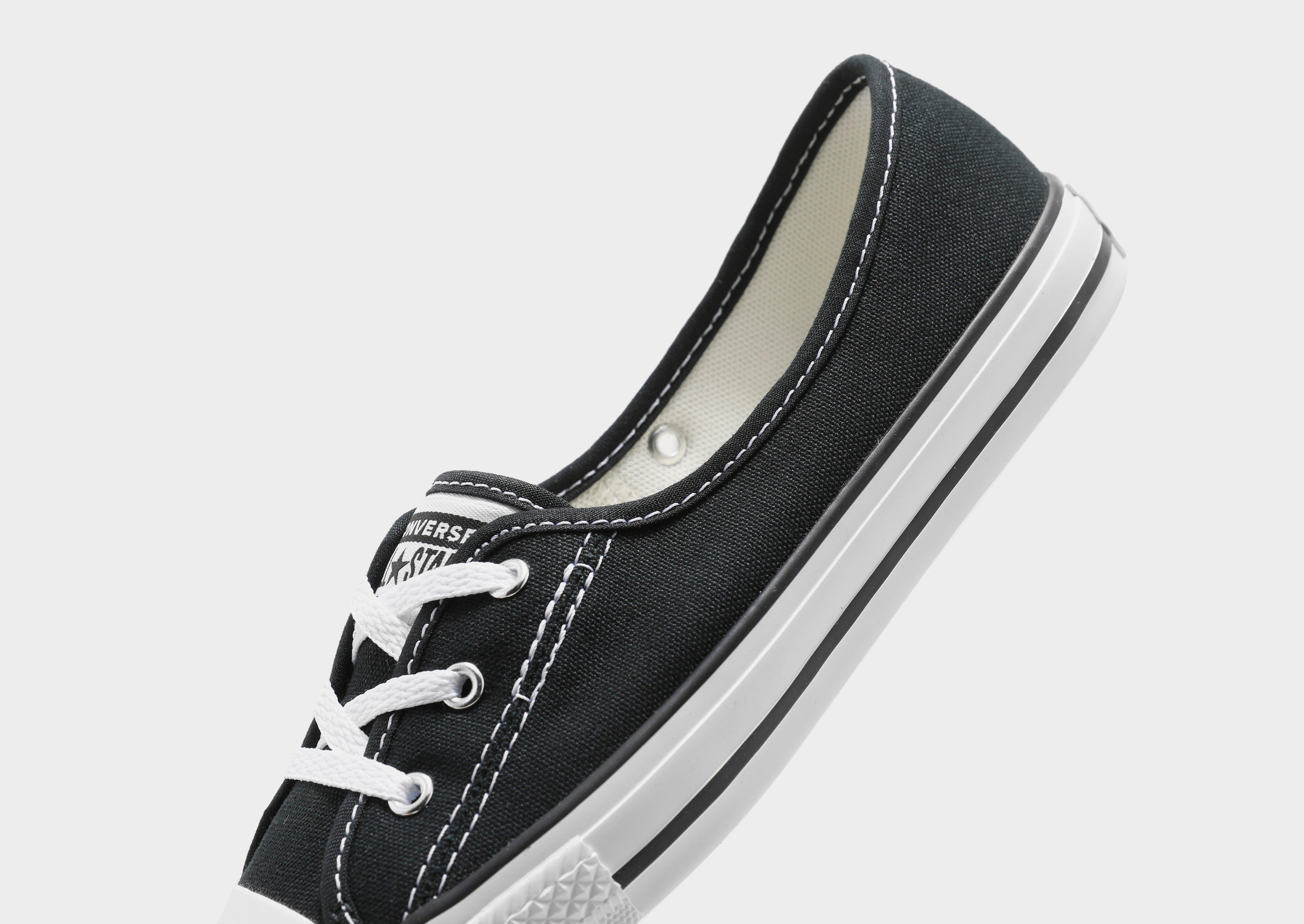 black and grey chuck taylors