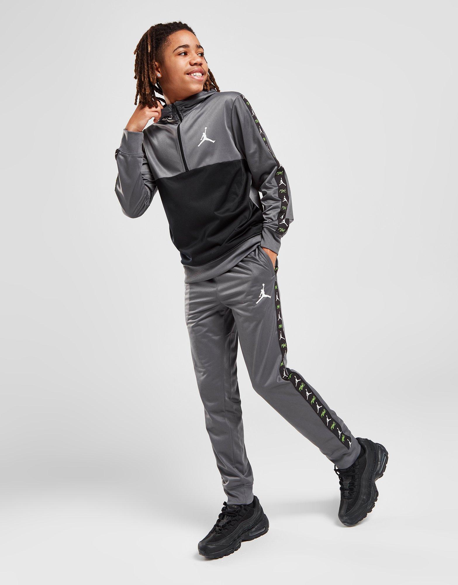 tape poly track pants