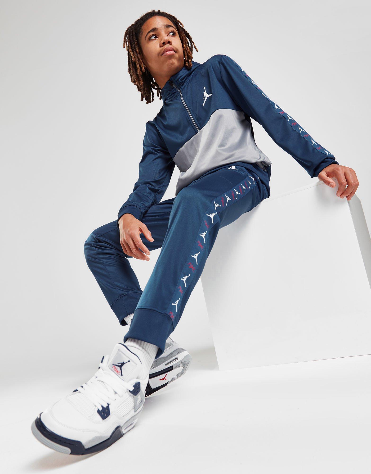 tape poly track pants