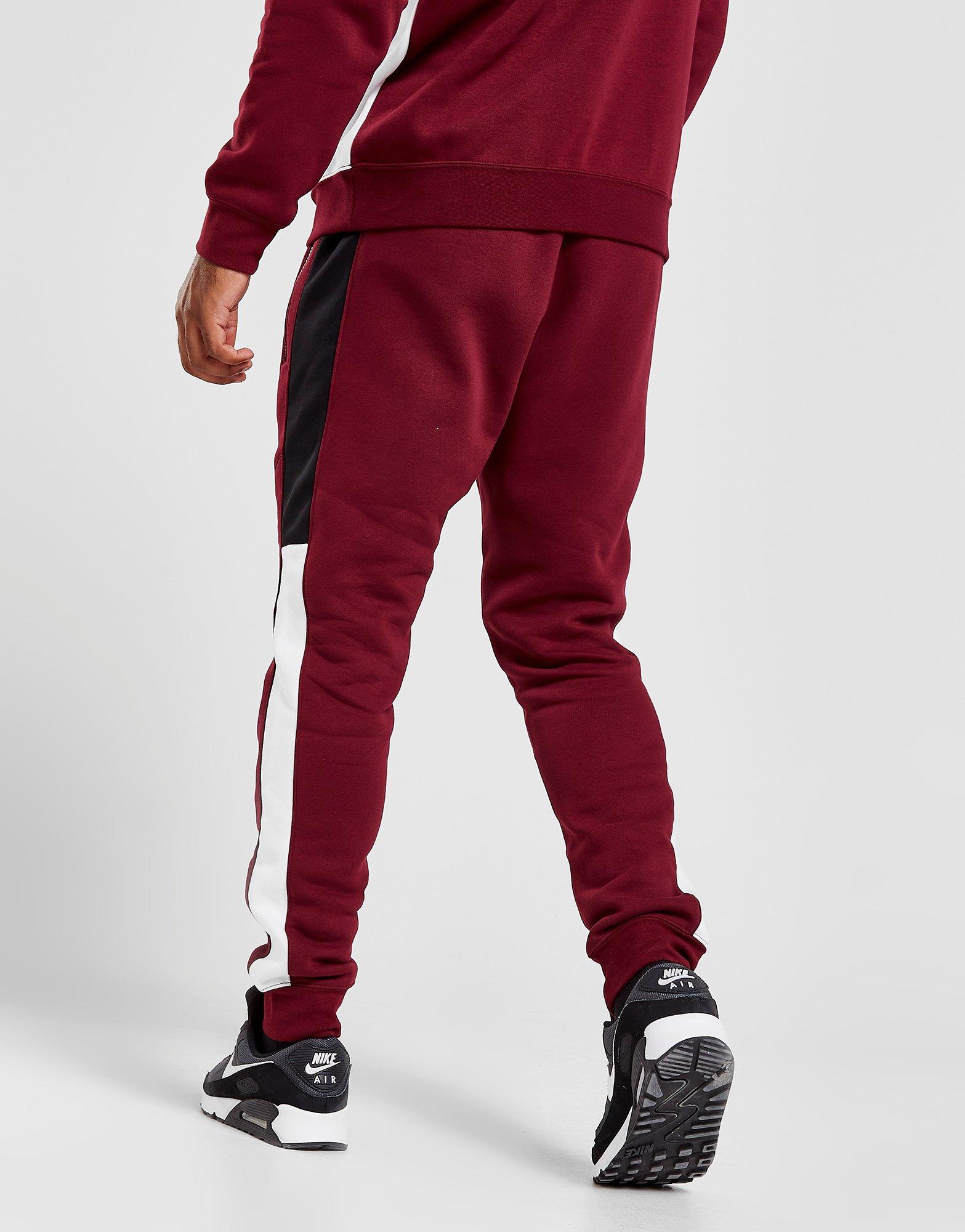 Barriga más lejos Hacer un nombre Compra Nike pantalón de chándal Hybrid Fleece en Rojo