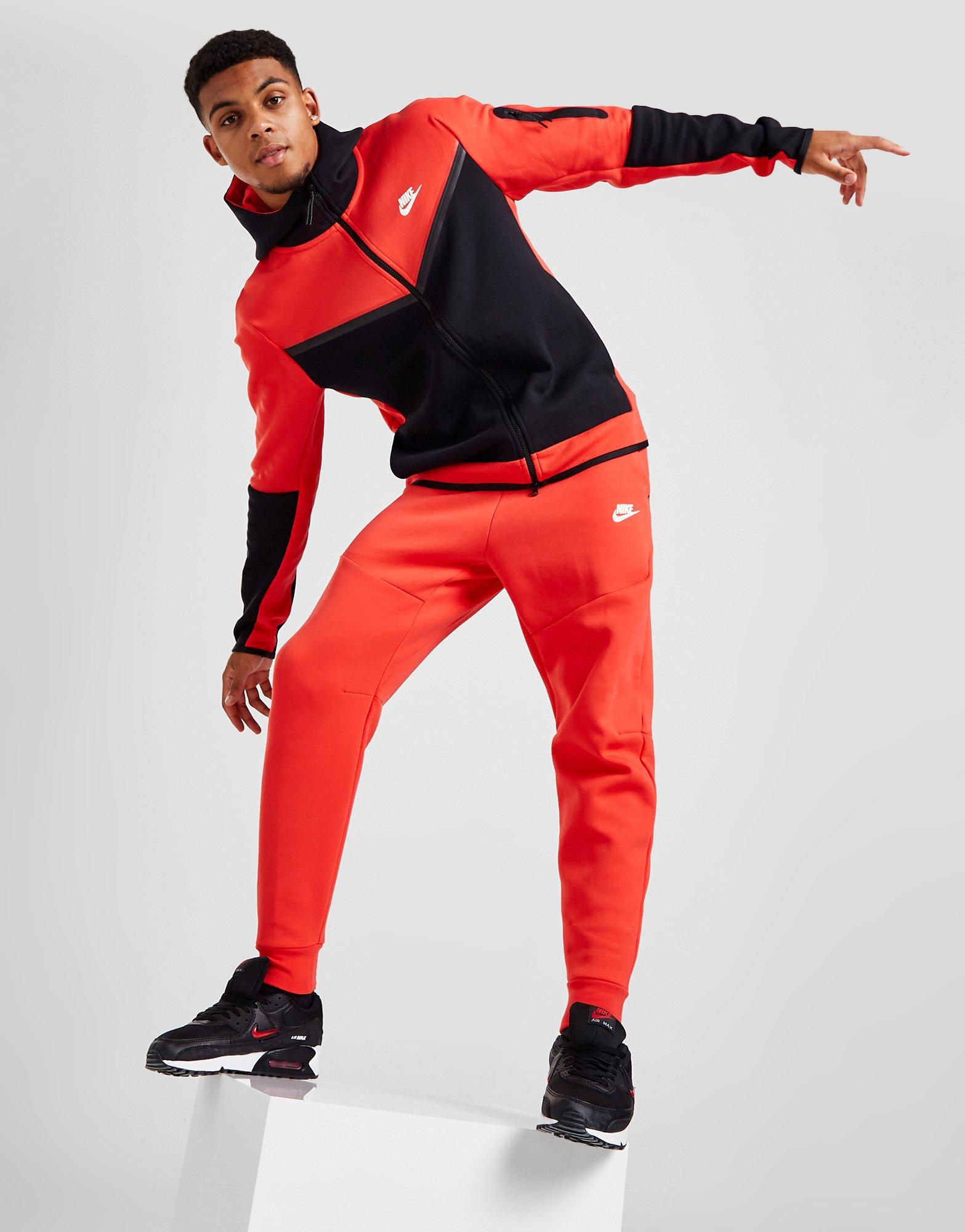 Red nike store tech tracksuit