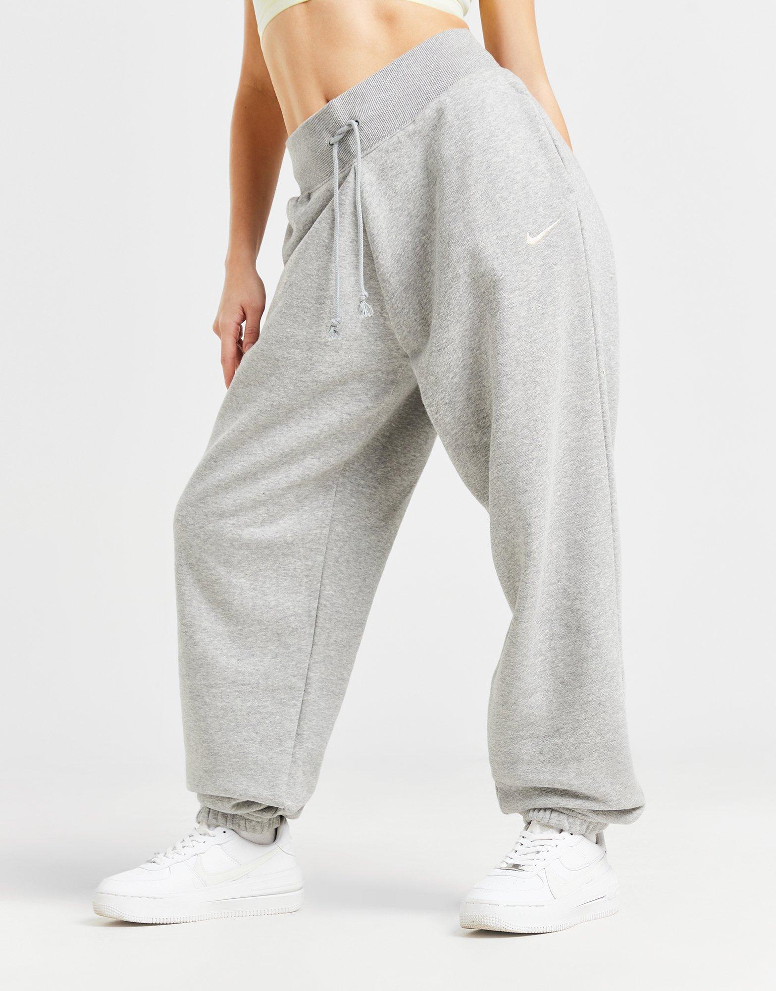 Nike Mini Swoosh High Waisted Wide Leg Sweatpants in Grey