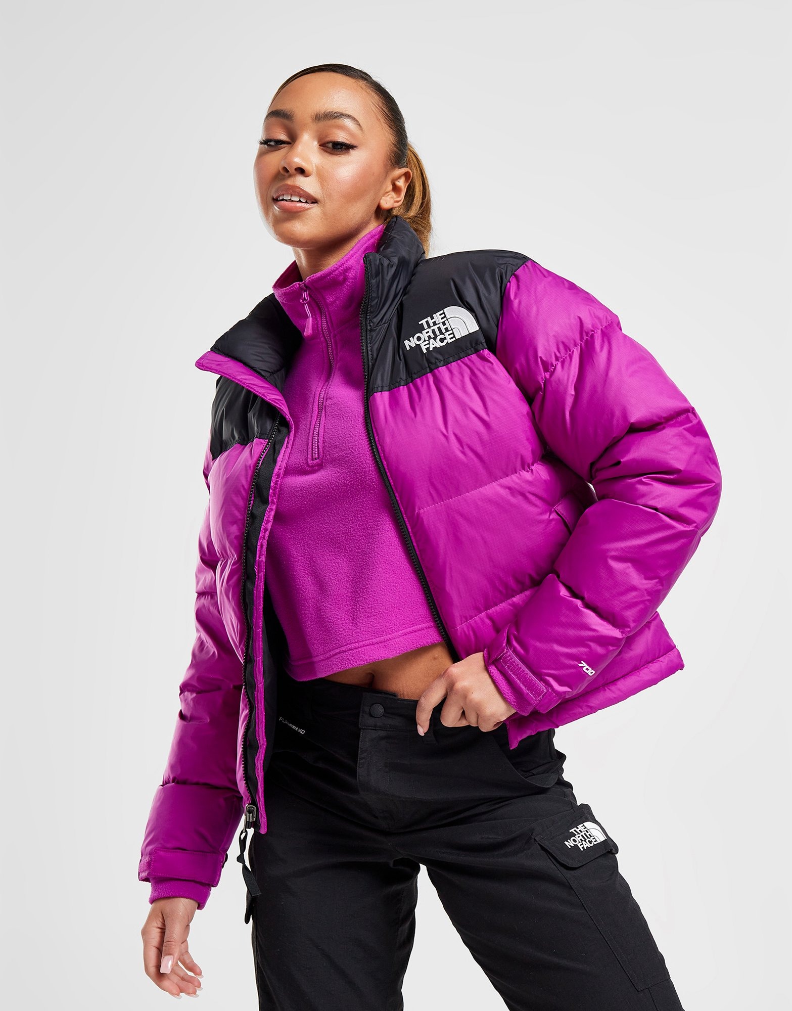 purple and black north face jacket