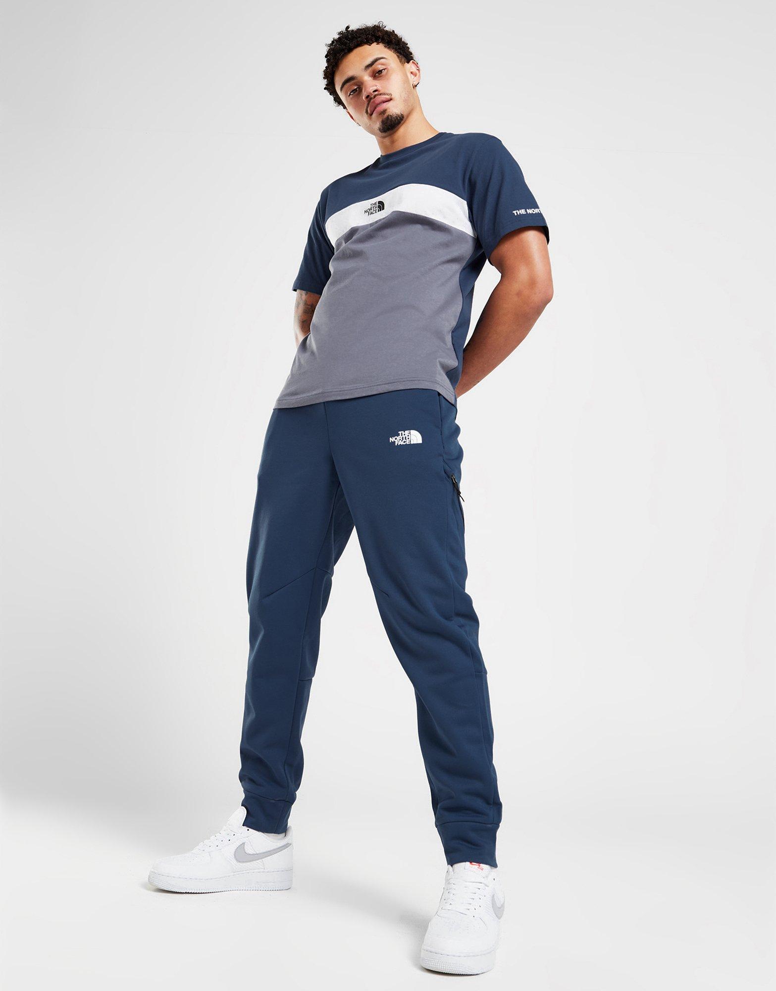 Blue north face tracksuit hotsell bottoms