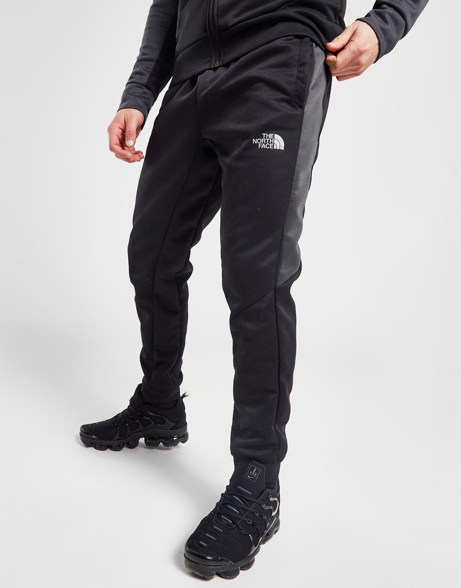 Black north face store tracksuit bottoms