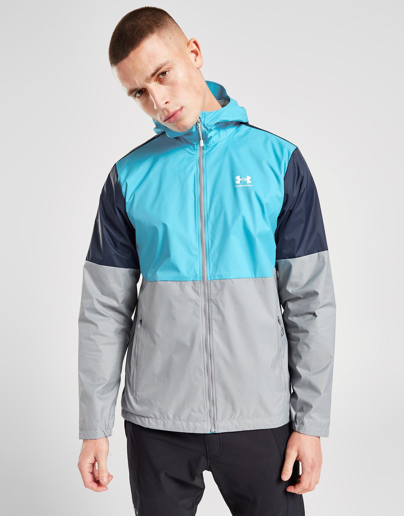 Voluntario Familiar tenaz Under Armour chaqueta cortavientos en Azul | JD Sports España