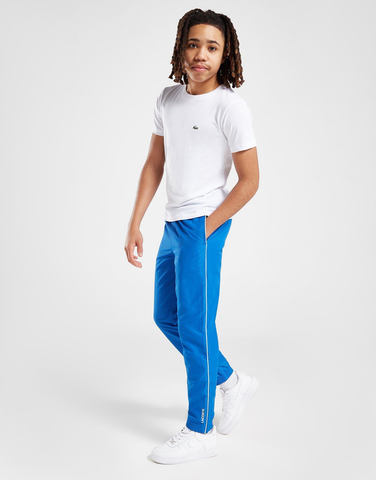 polet Badeværelse Anerkendelse Blue Lacoste Piped Woven Track Pants Junior | JD Sports Global