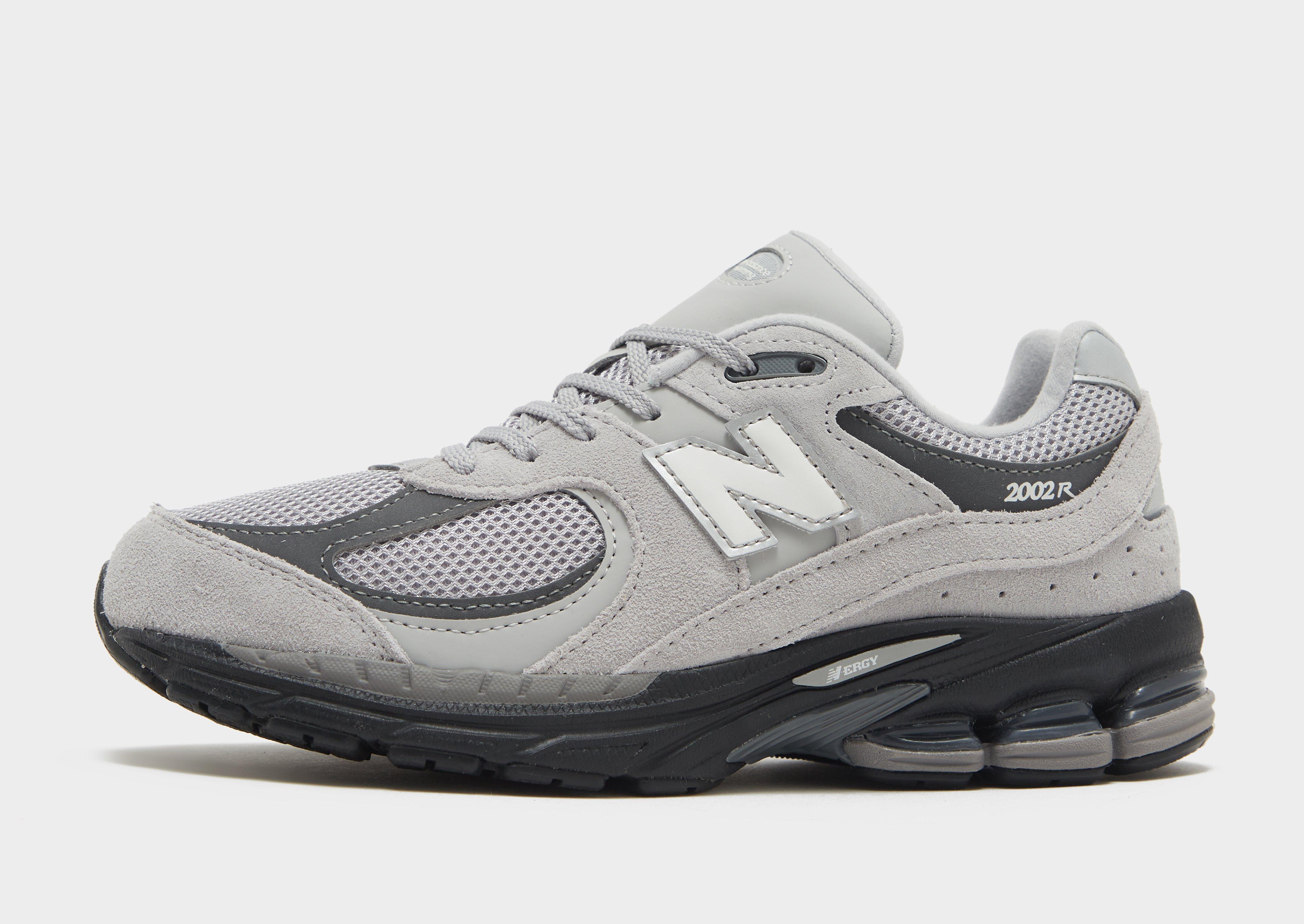 New balance 711 kinderen on sale grijs