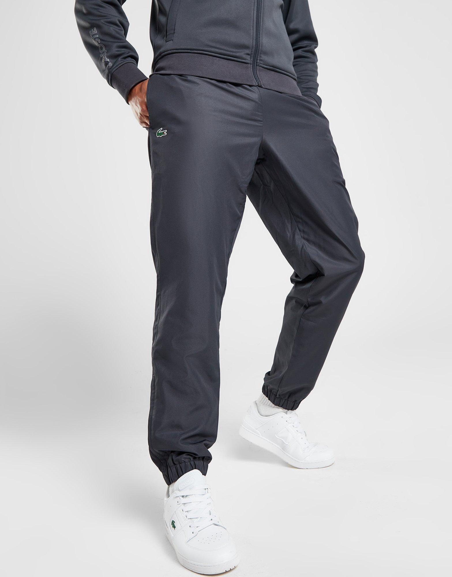 Lacoste guppy track pants black best sale