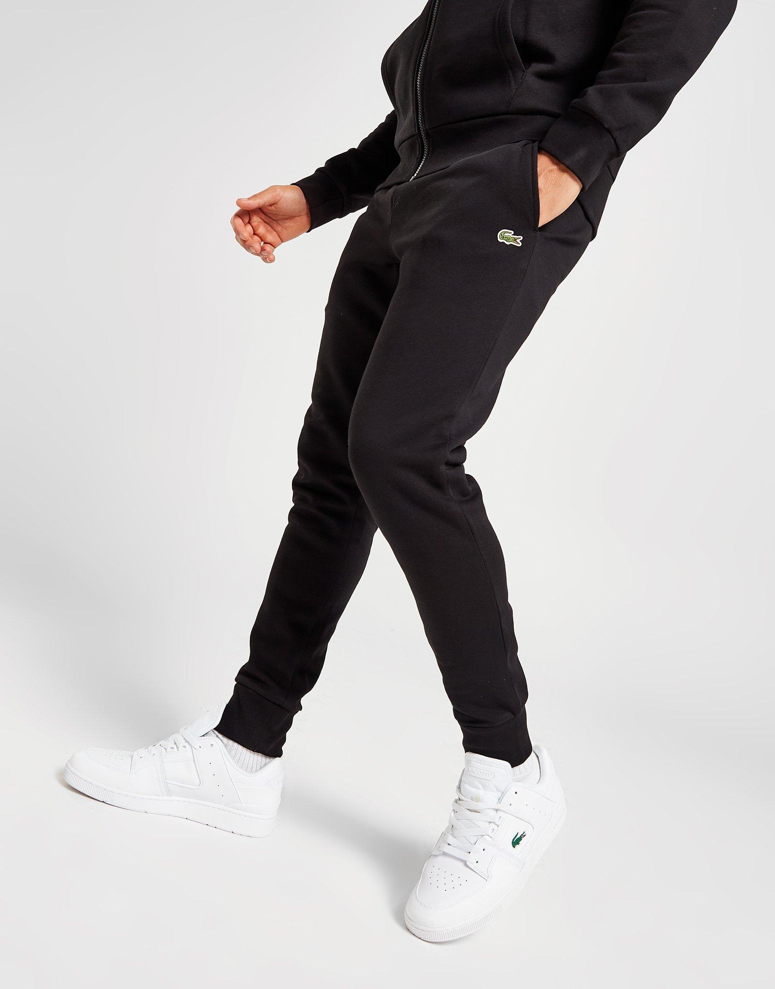 Black lacoste best sale tracksuit bottoms