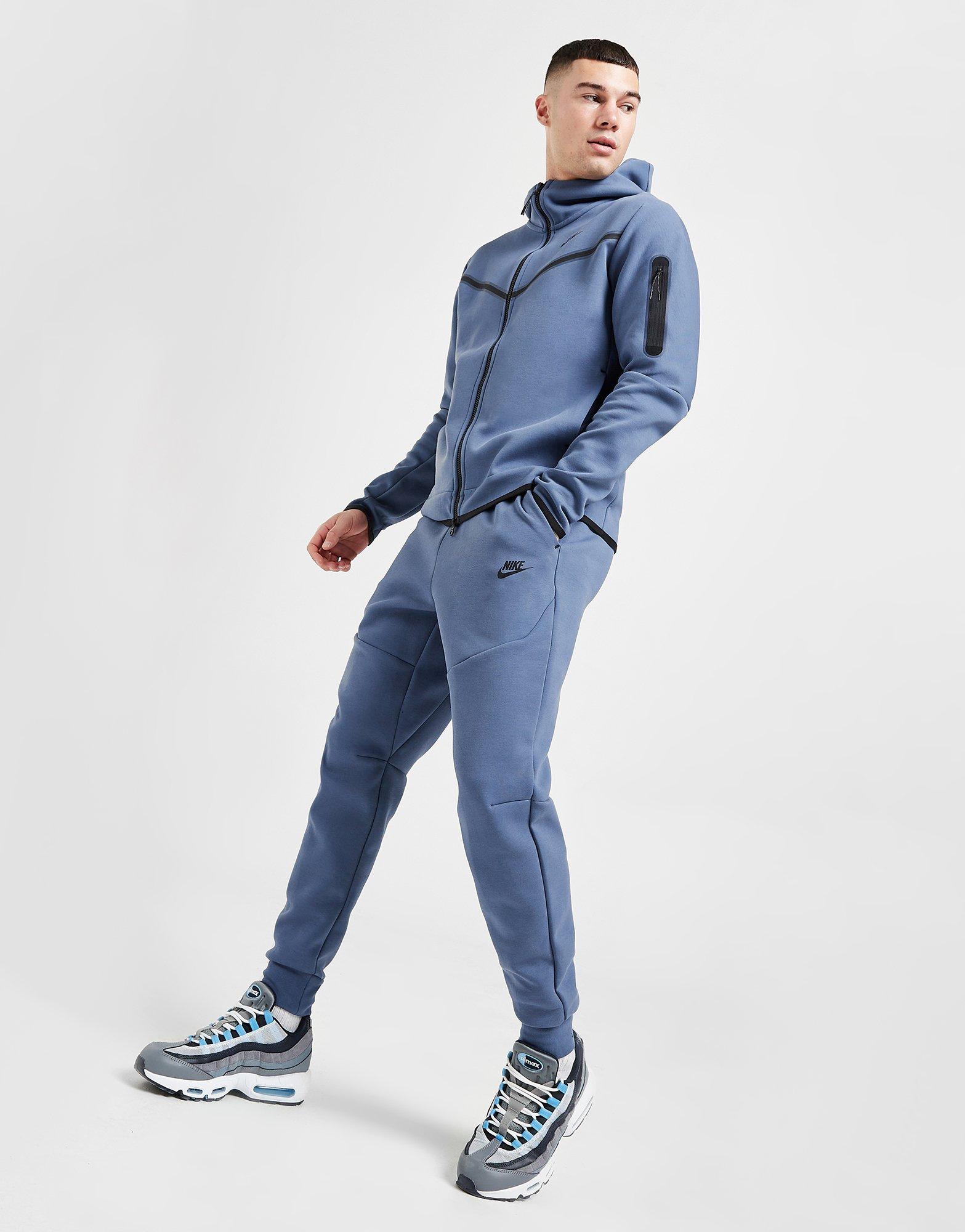 Nike tech tracksuit store blue