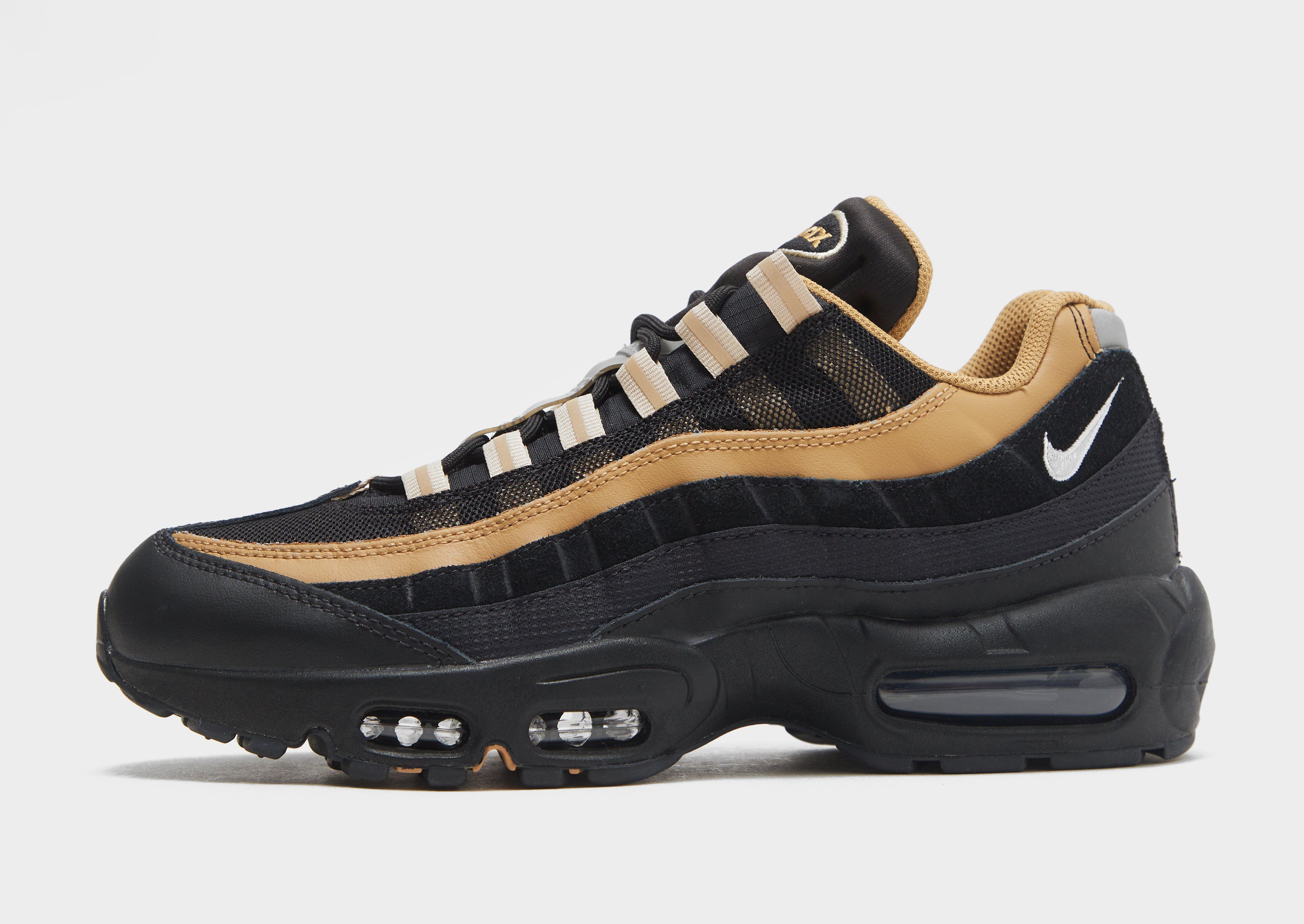 black and gold nike 95