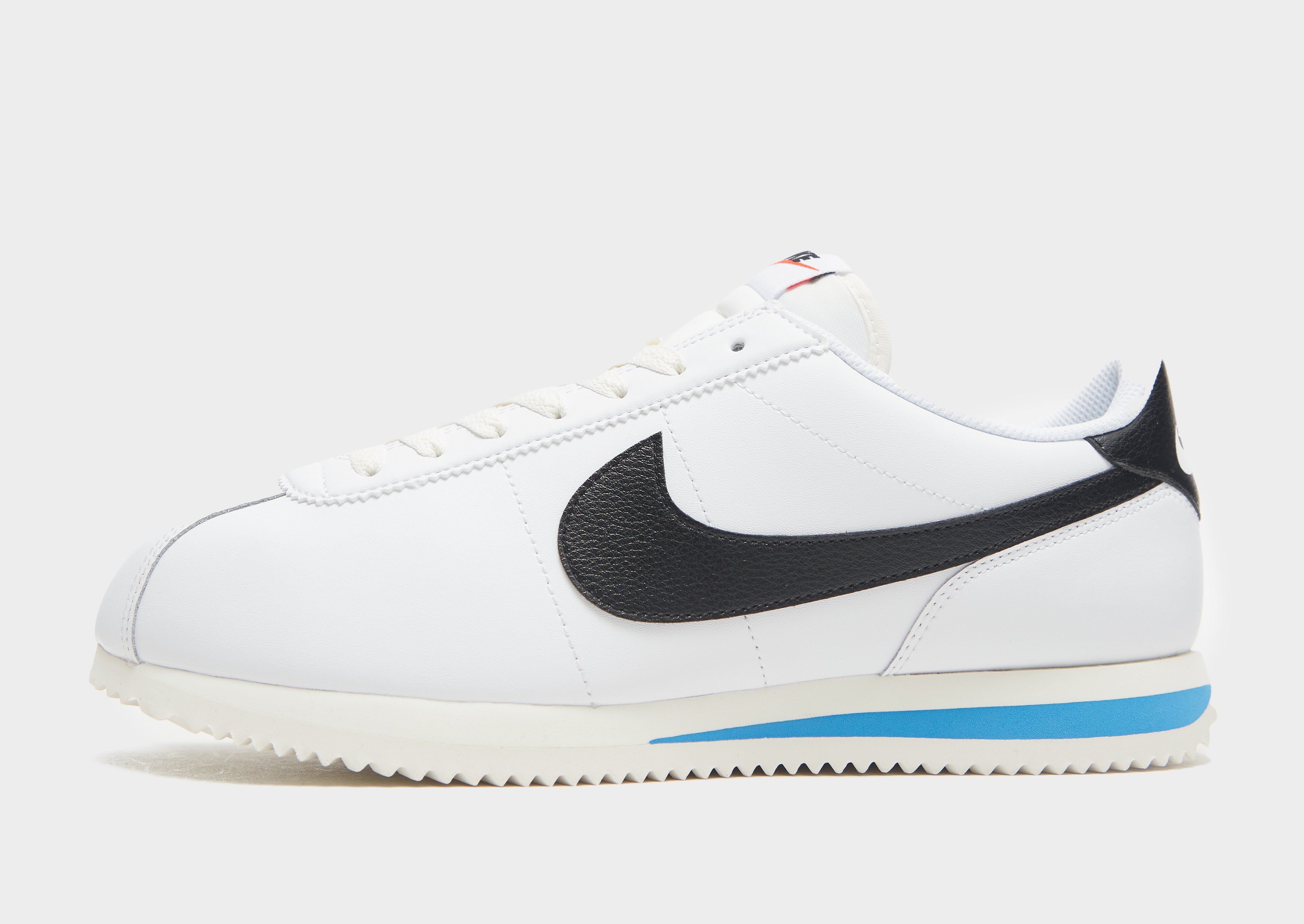 Nike cortez nz white on sale