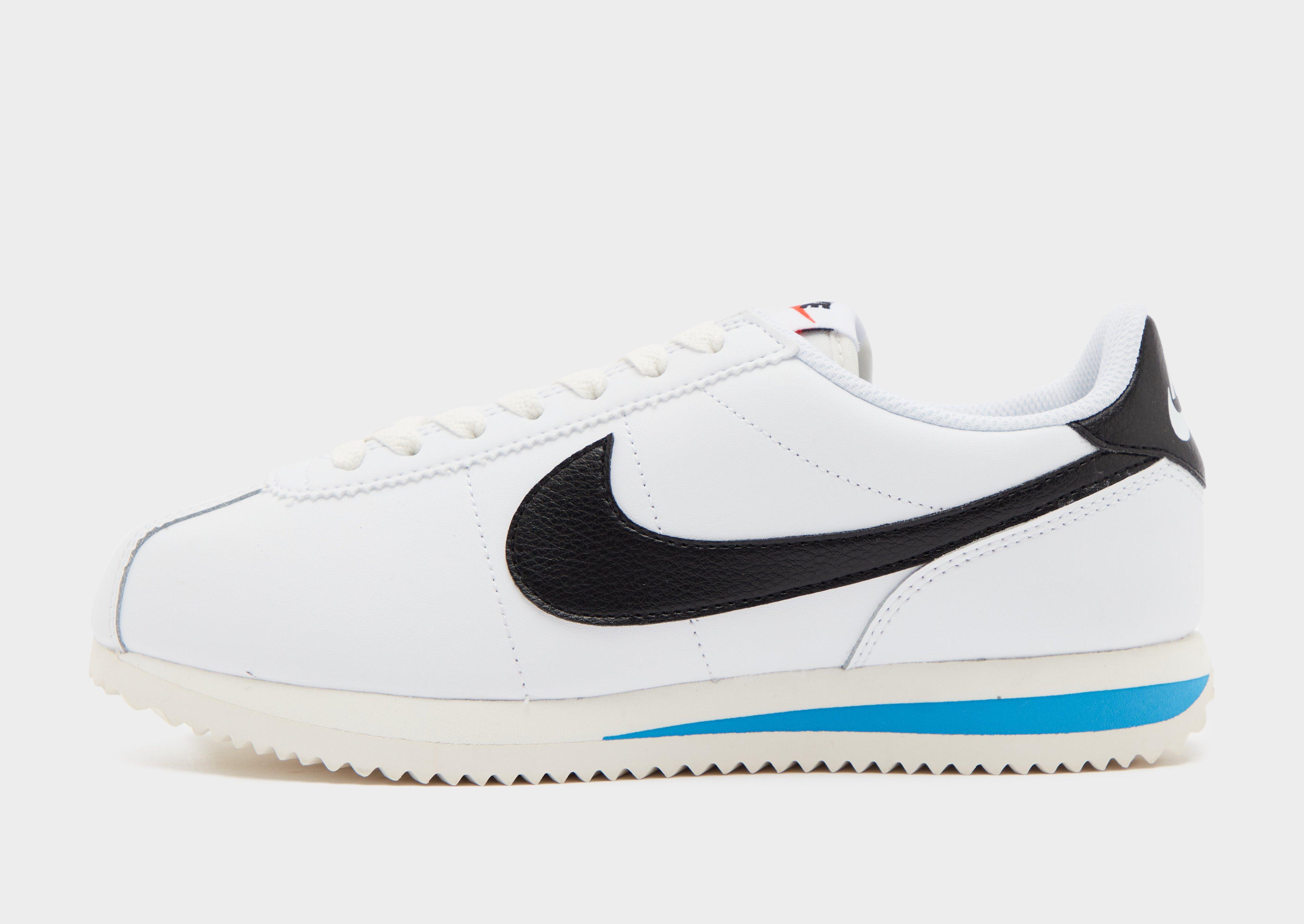 Mens white nike store cortez