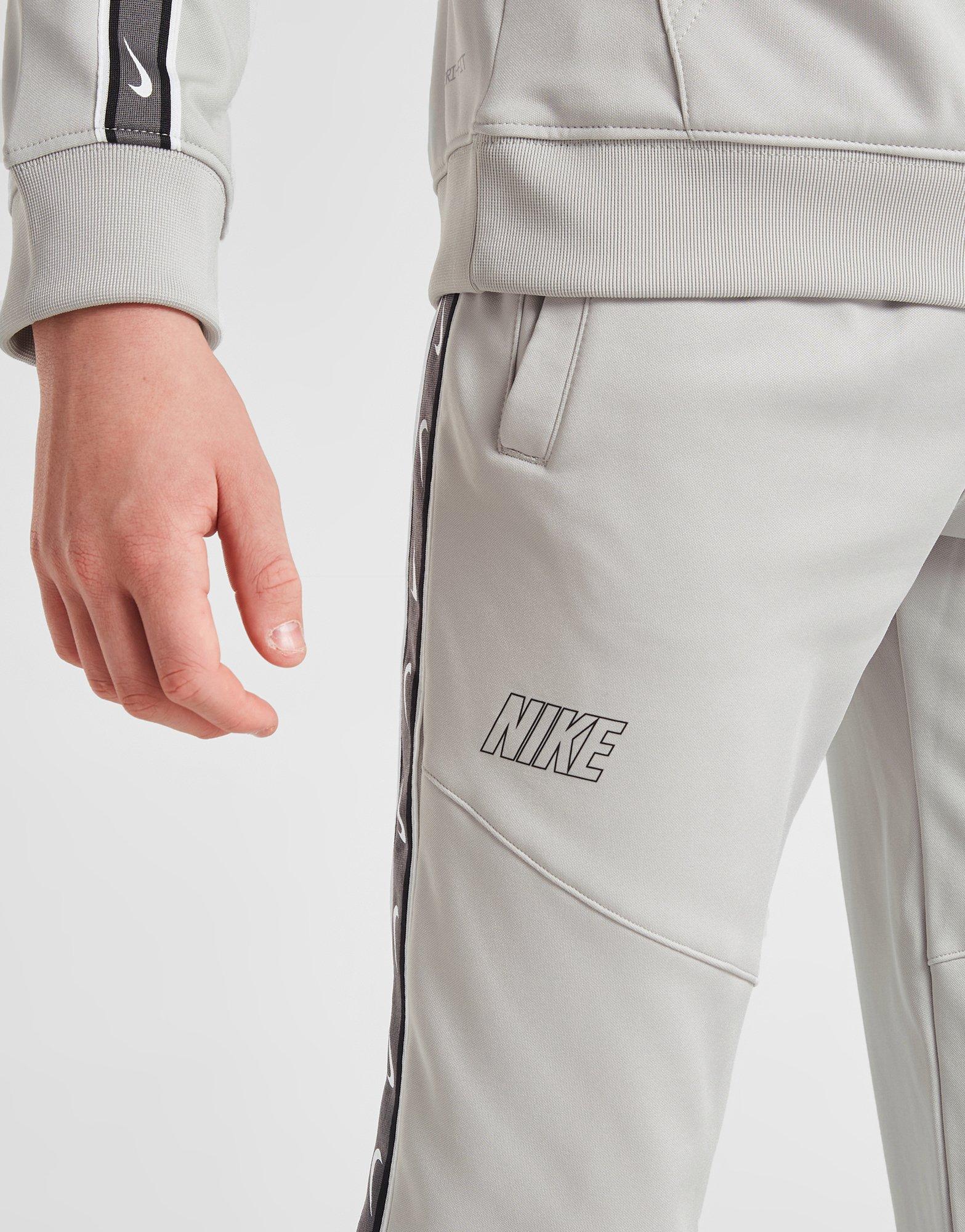 Nike tribute best sale pants grey