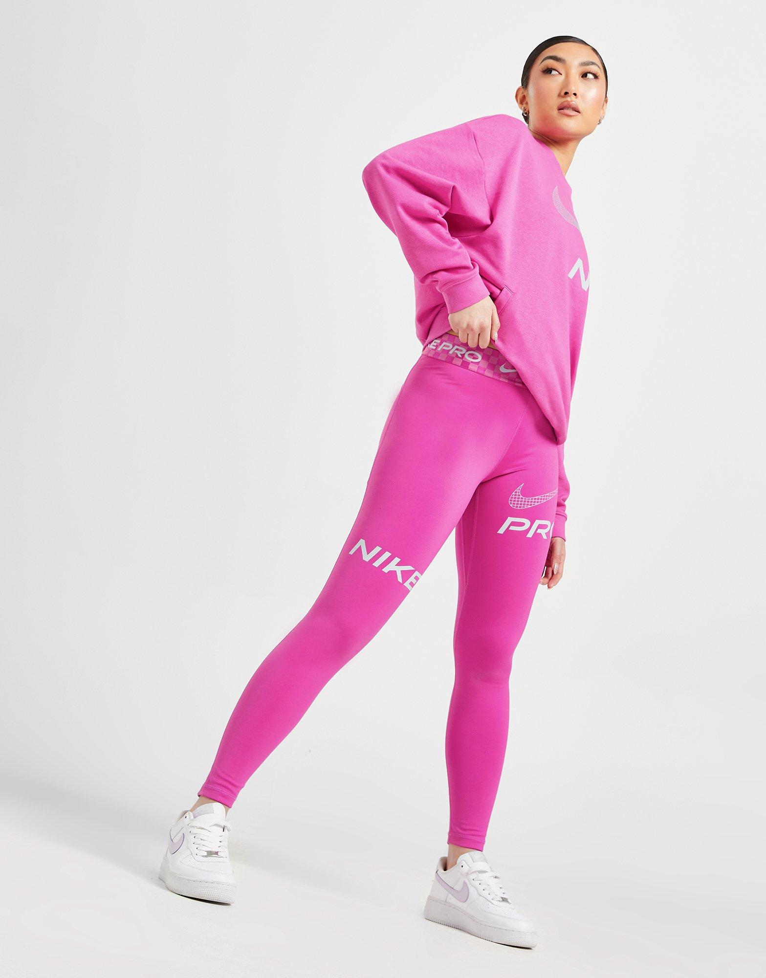 Pink best sale nike tights