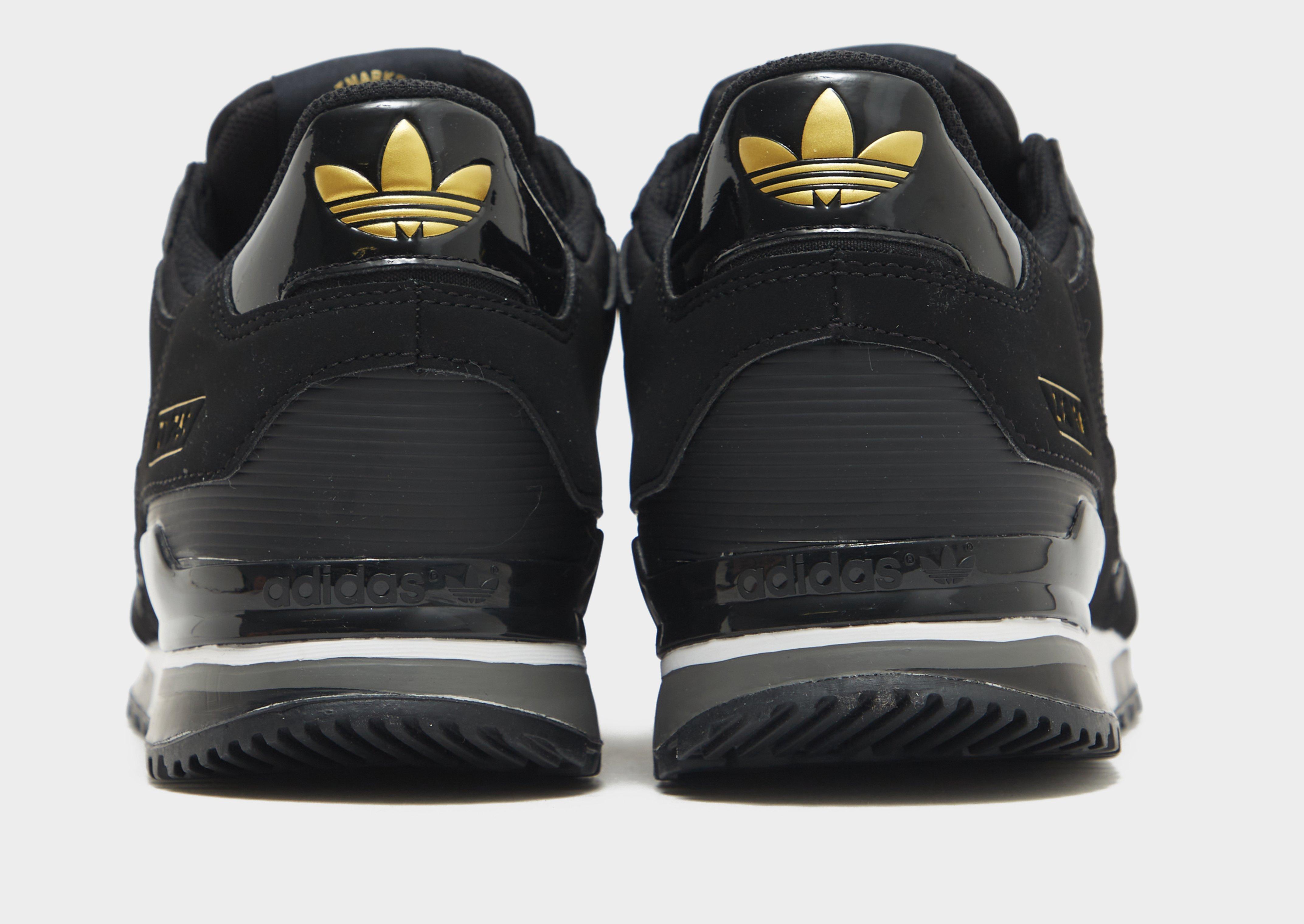 Black and gold adidas cheap zx