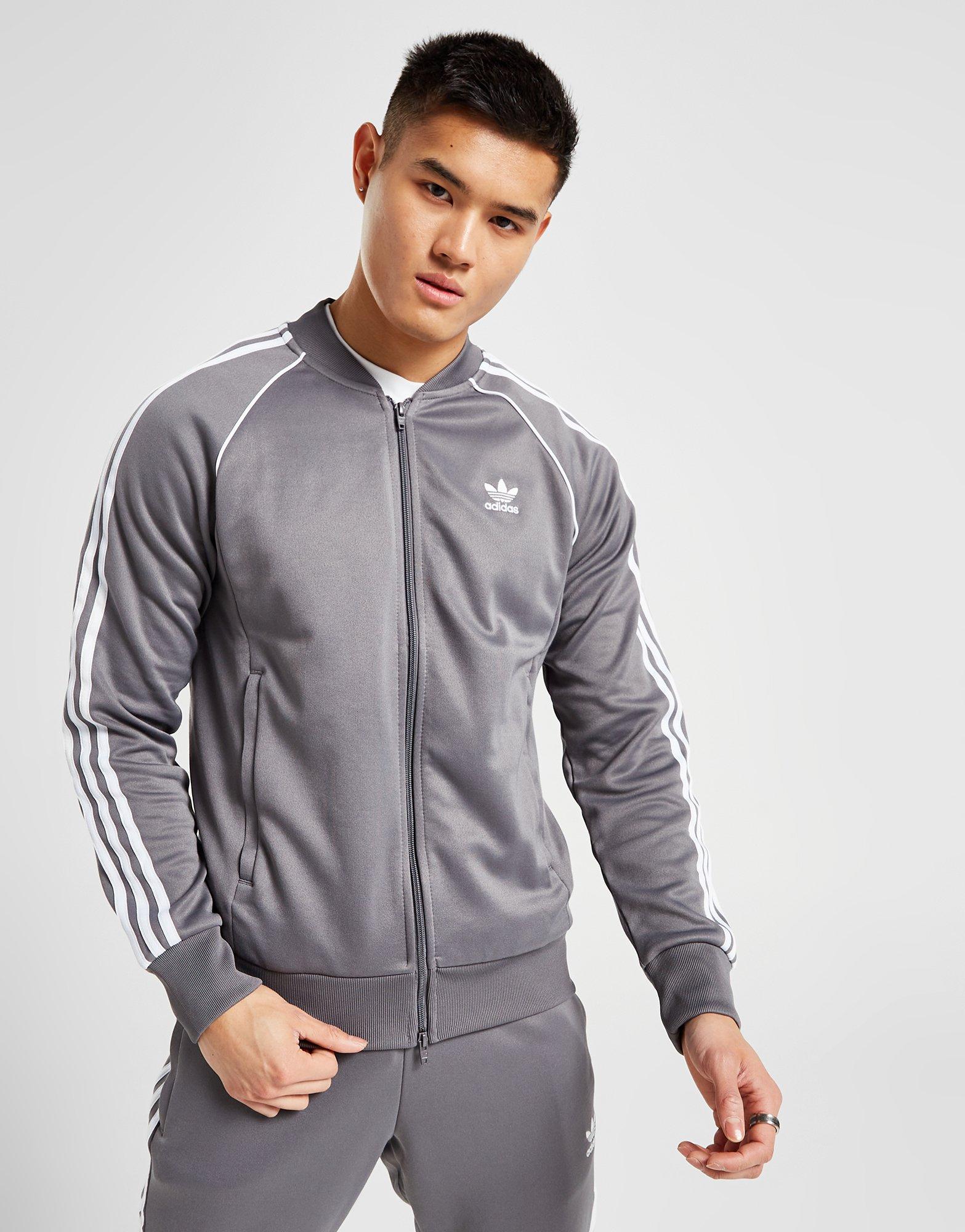 Grey adidas track top new arrivals