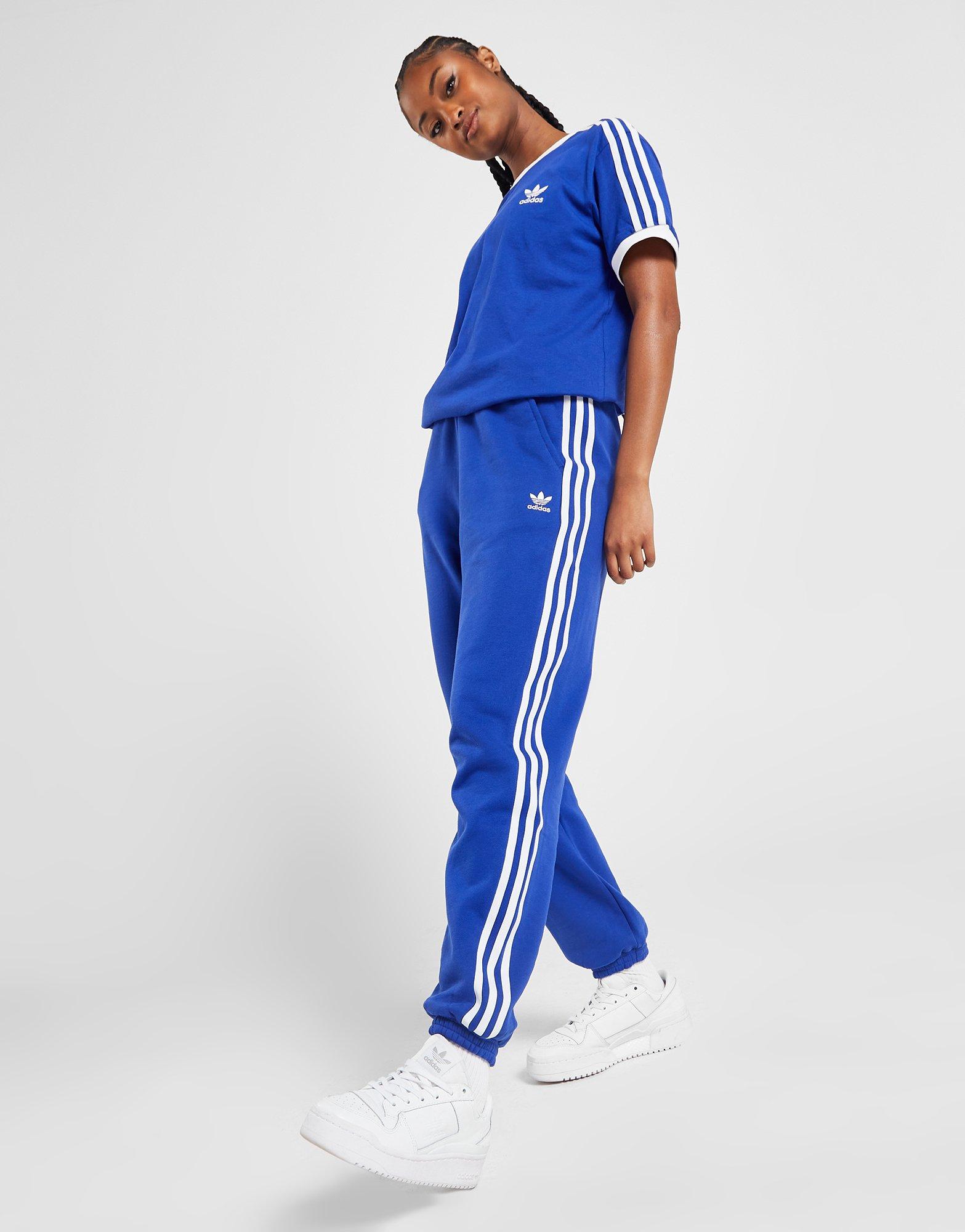 legumbres Tranquilidad de espíritu Permanecer de pié Blue adidas Originals 3-Stripes Oversized Joggers | JD Sports Global