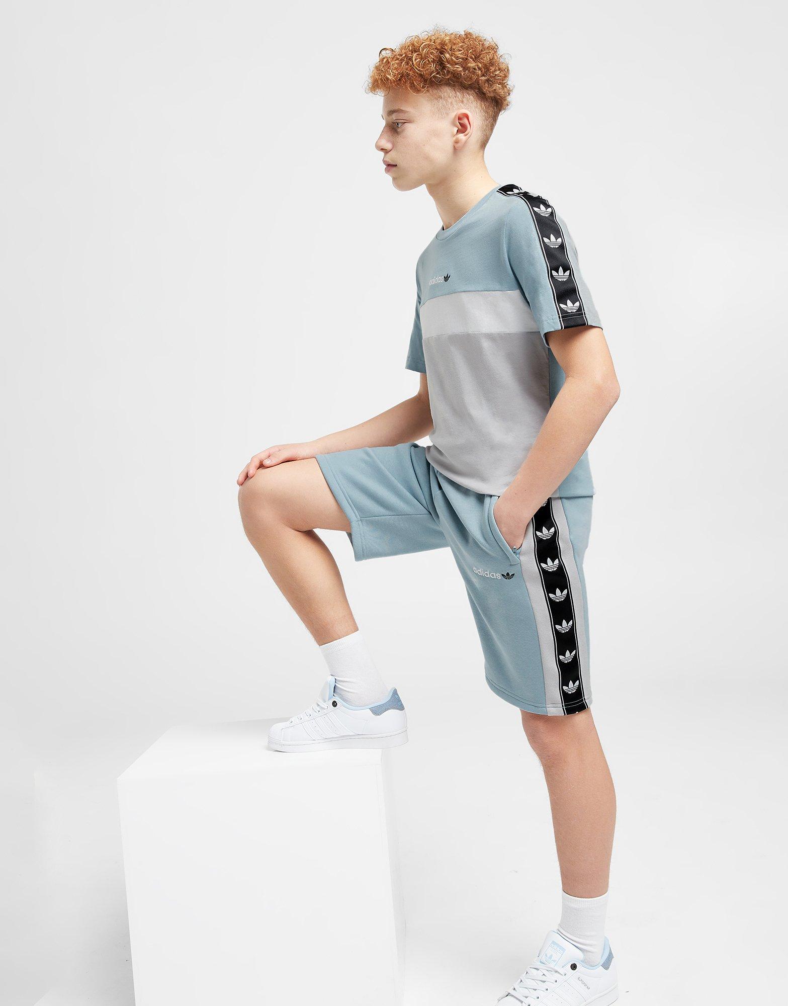 Adidas store taped shorts