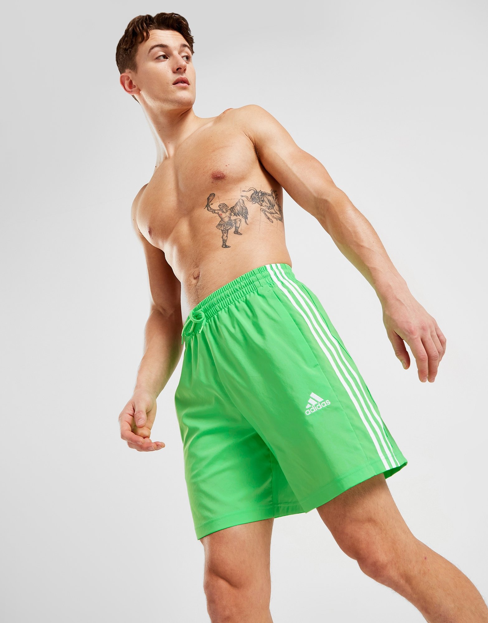 Green adidas Badge Of Sport Woven Swim Shorts | JD Sports UK