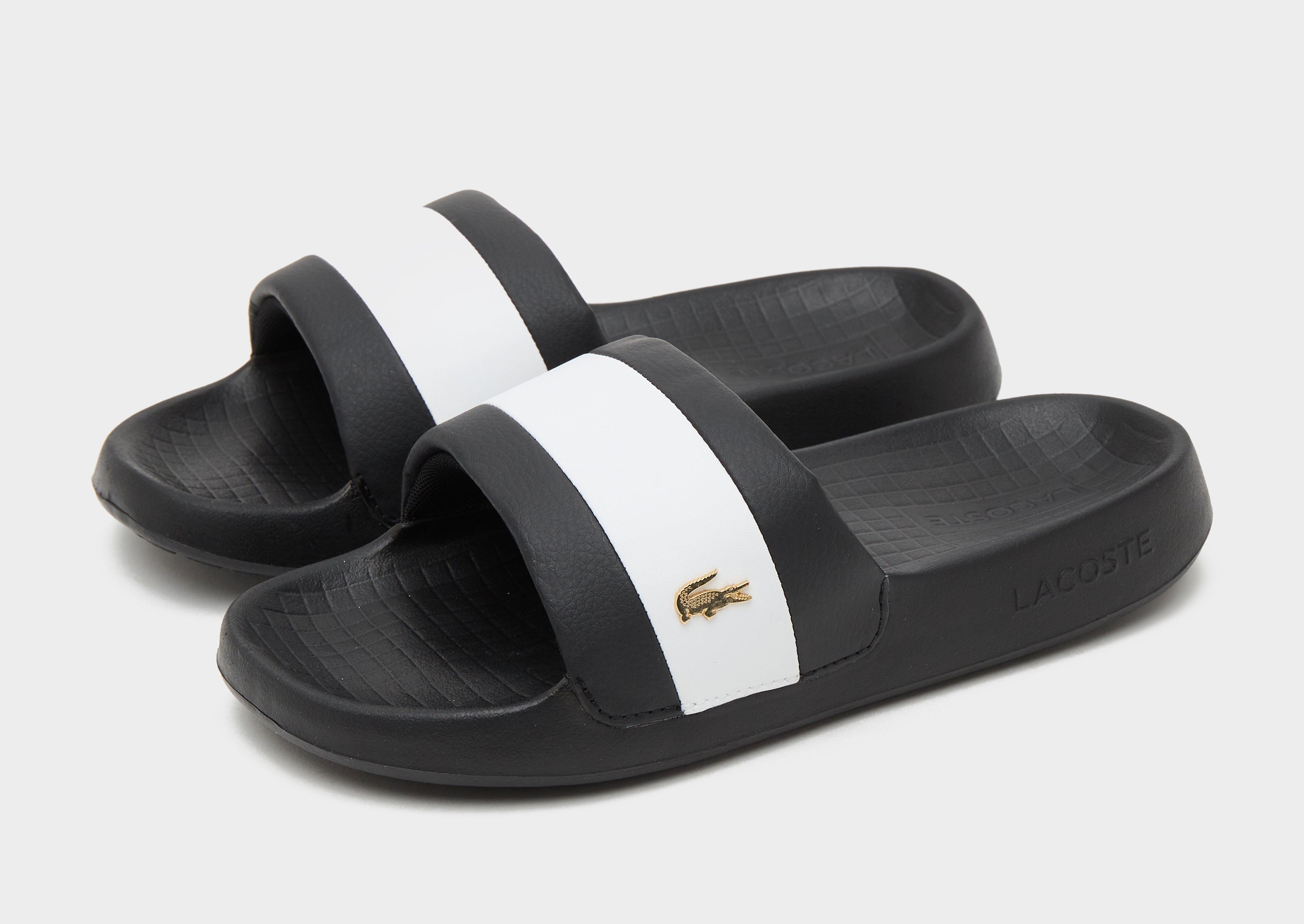 Women hotsell lacoste slides