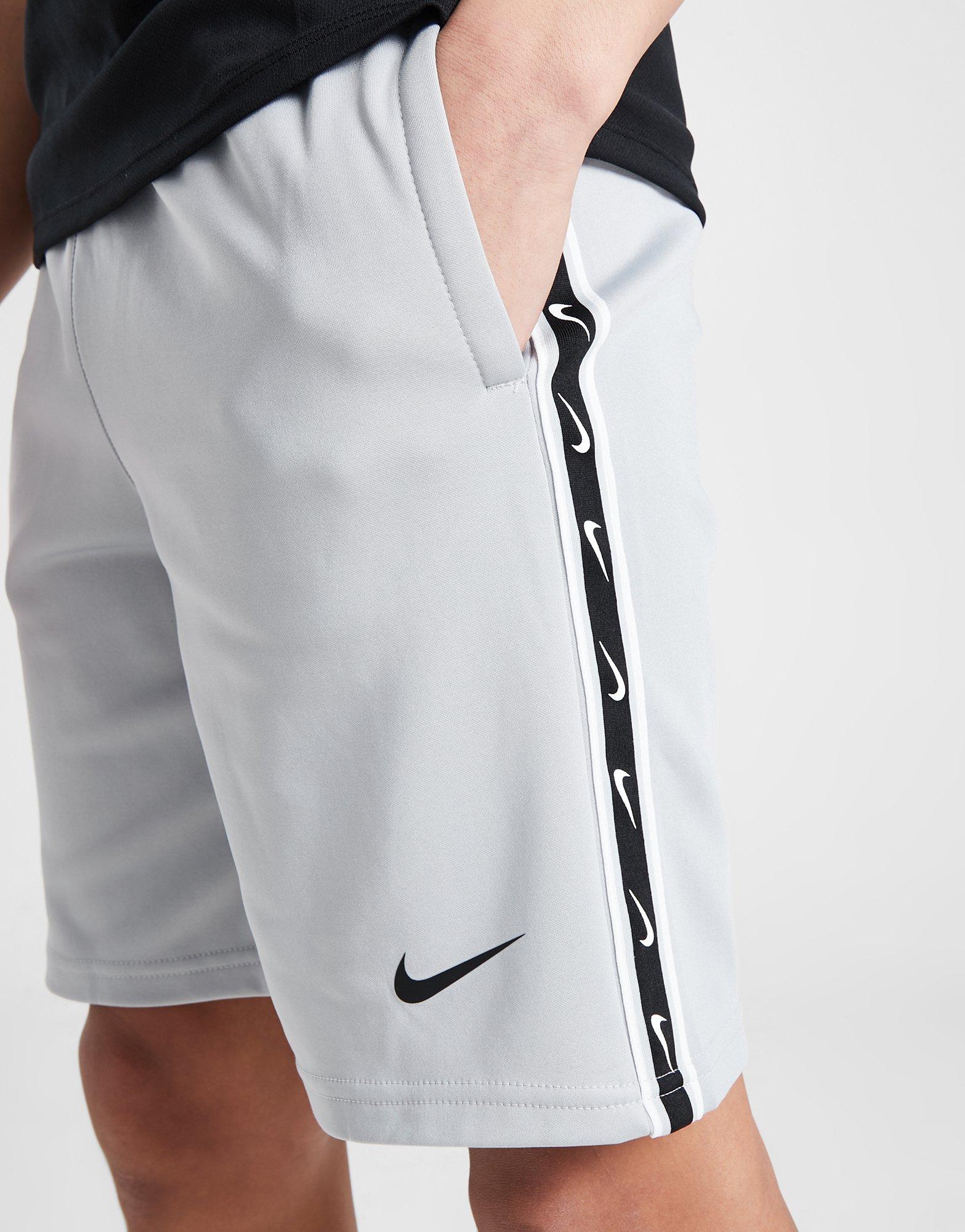 nike tape poly shorts Cinosural International School