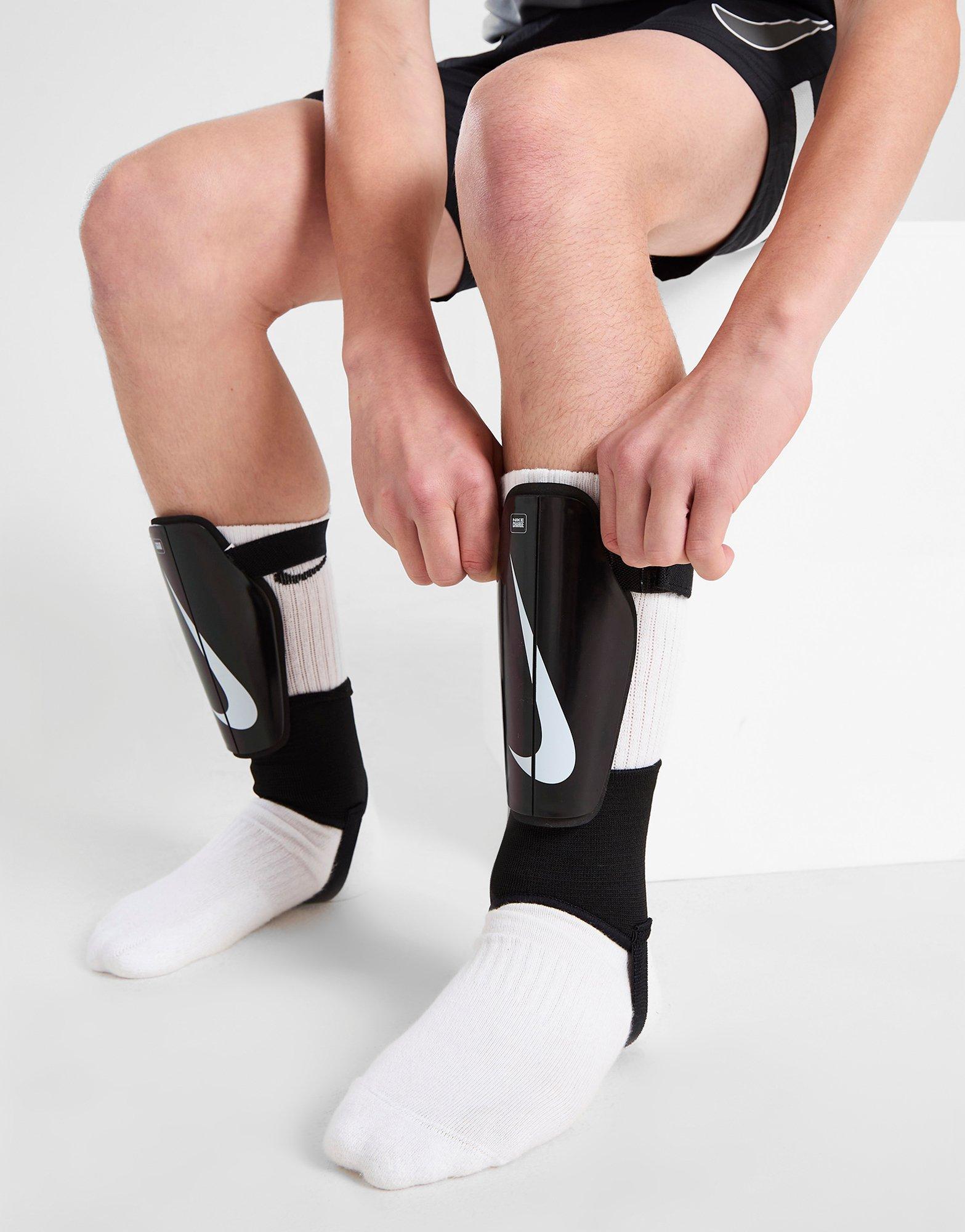 Nike shin pads store with ankle support